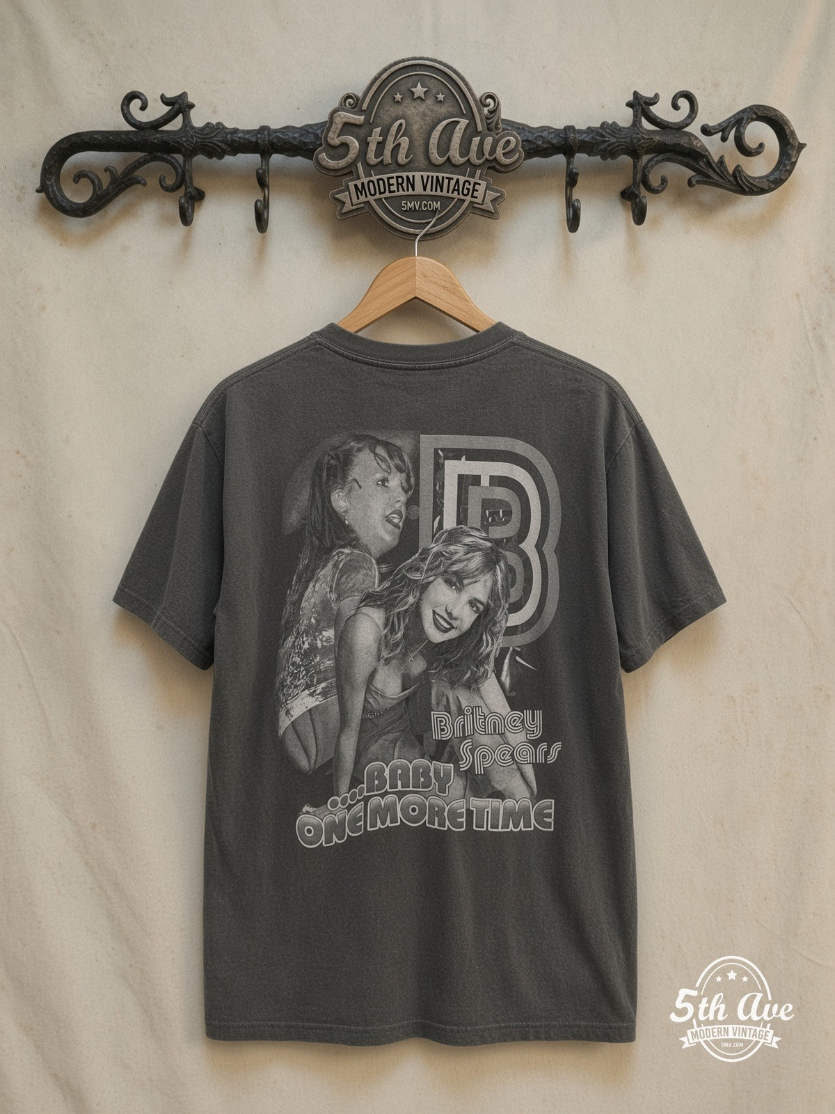 Britney Baby One More Time T-Shirt — back on locked cream ornate 5th Ave rack