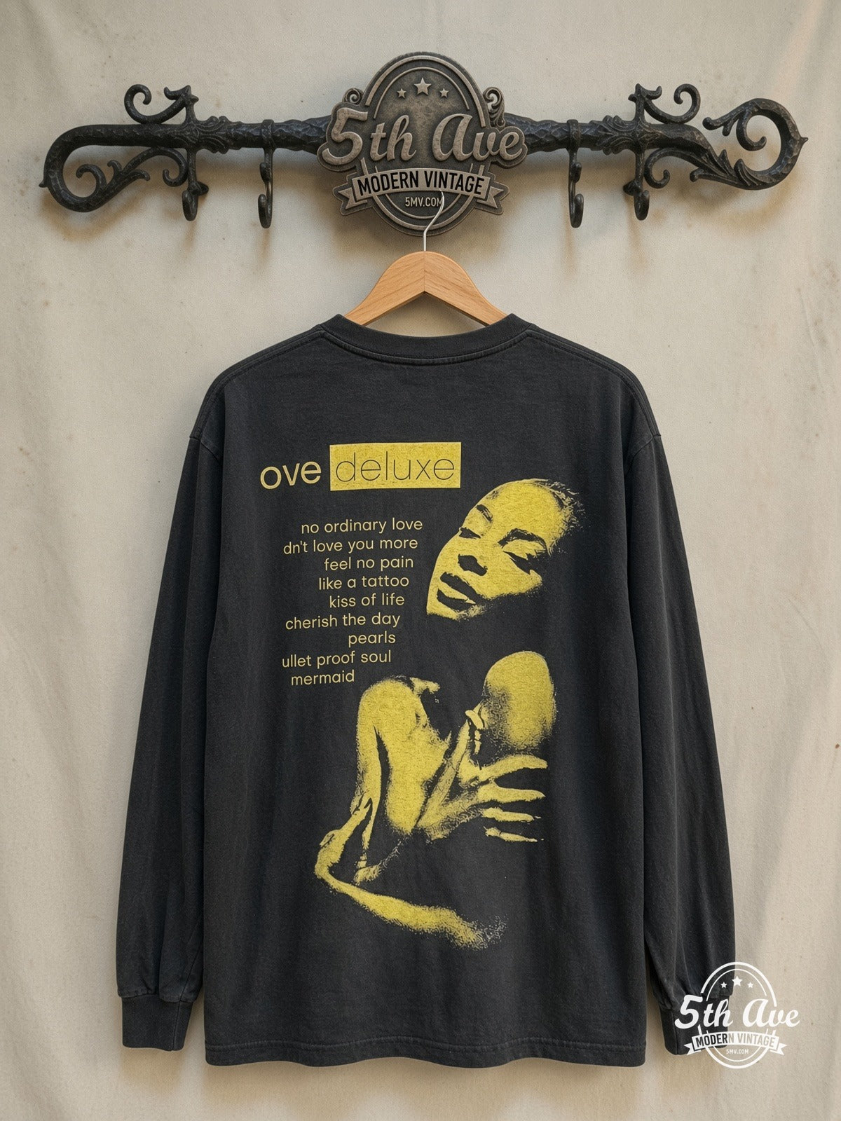 Sade – Love Deluxe – Vintage Band T-Shirt — back on locked cream ornate 5th Ave rack
