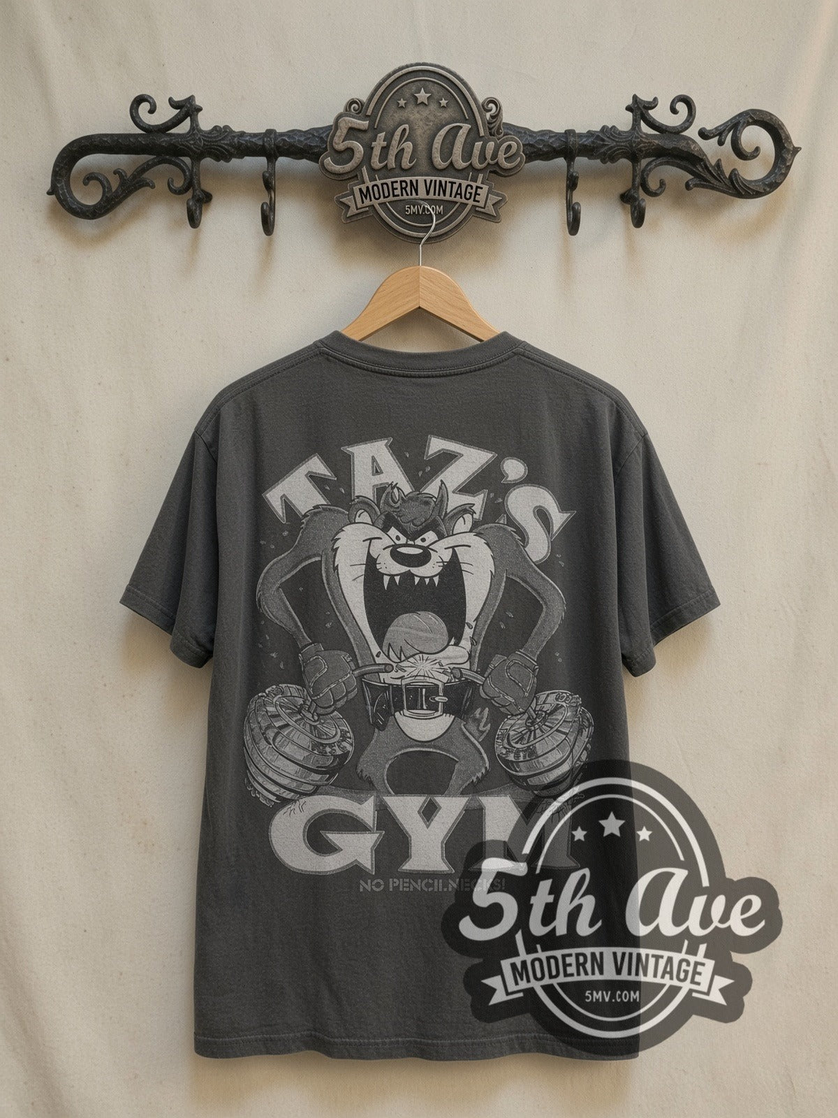Taz's Gym No Pencilnecks Black vintage cartoon tee in black, back view on a display rack