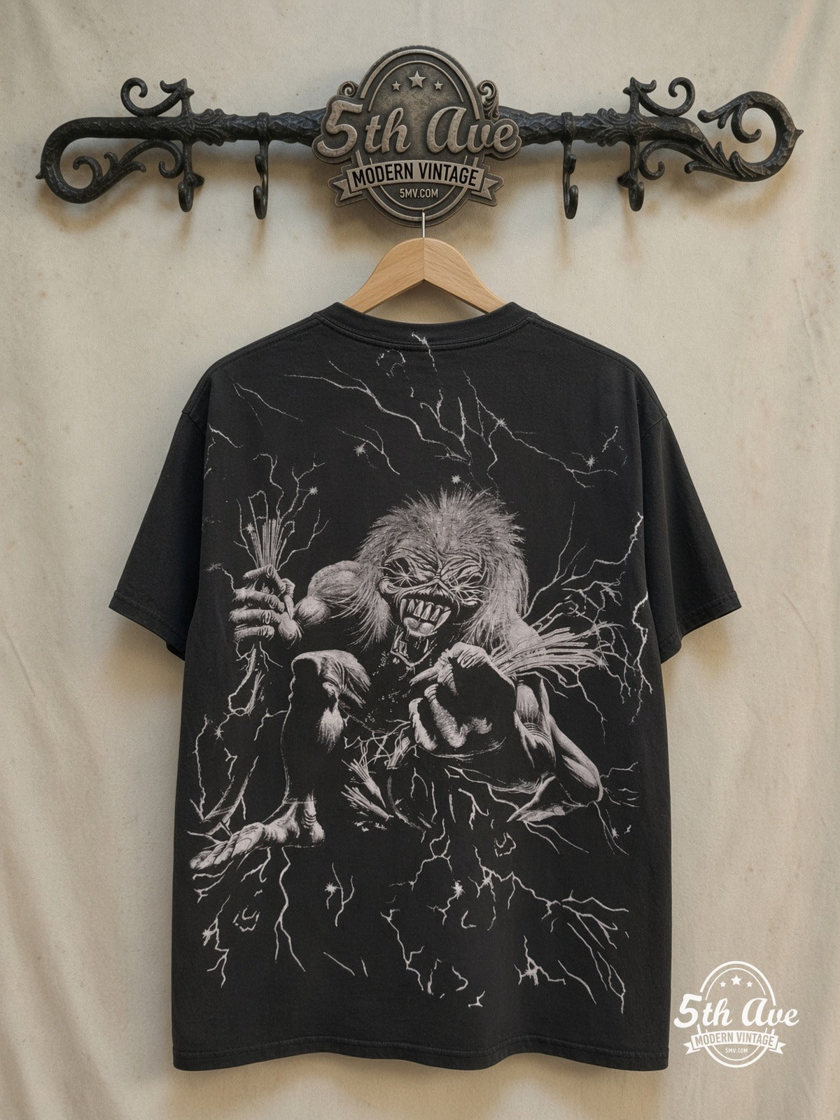 Iron Maiden – Eddie Overprint – Vintage Band T-Shirt — back on locked cream ornate 5th Ave rack