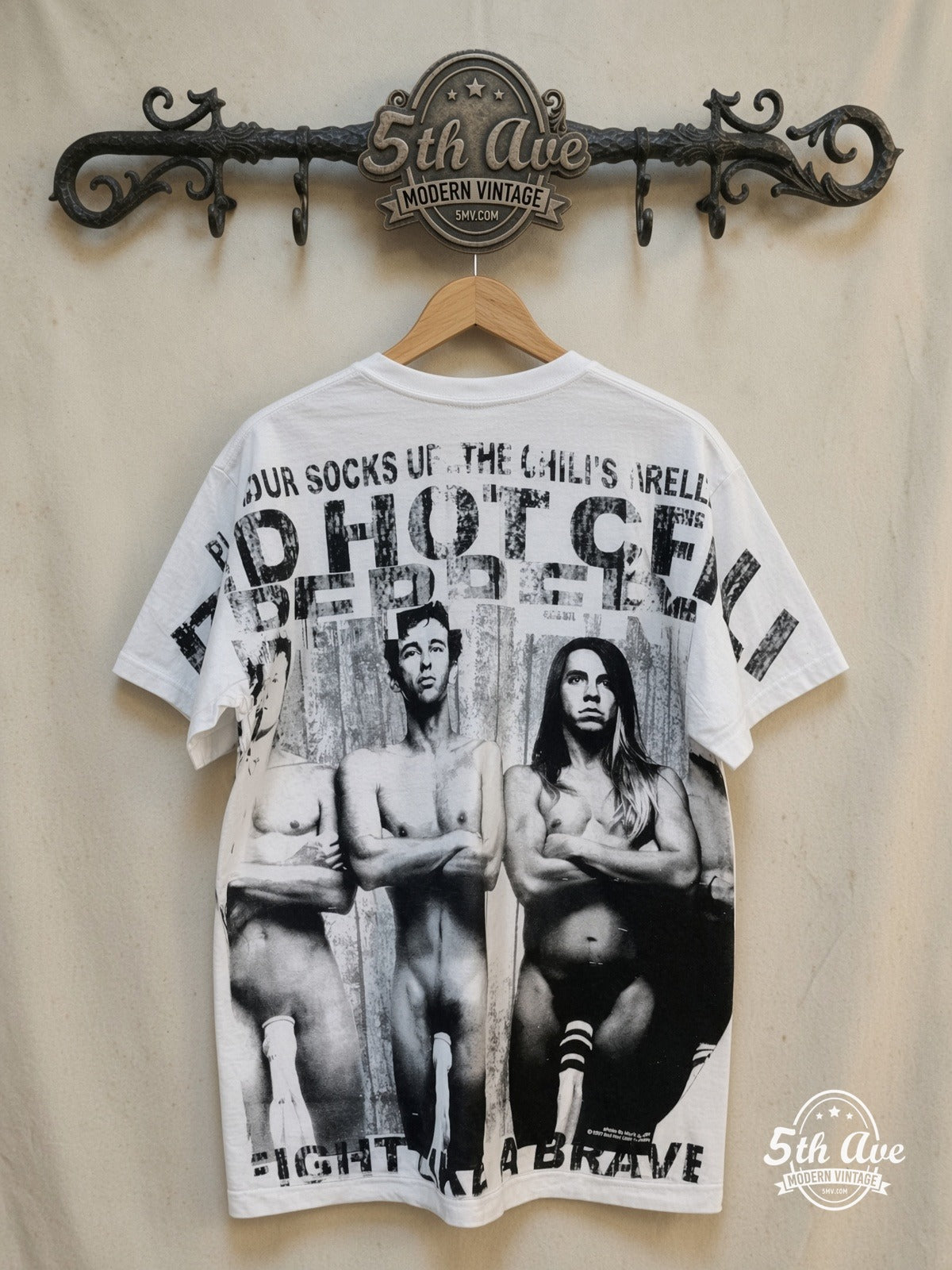 Red Hot Chili Peppers – Fight Like a Brave – All Over Print – Vintage Band T-Shirt — back on locked cream ornate 5th Ave rack