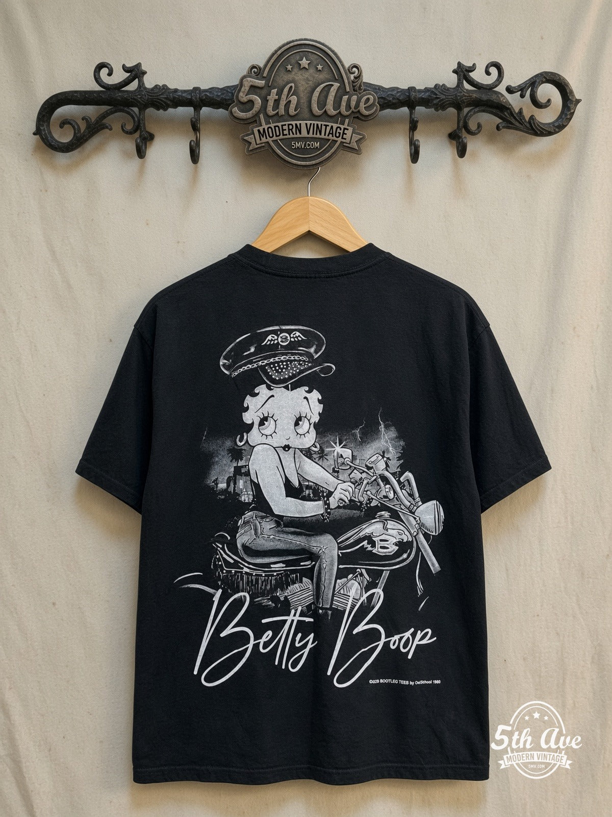 Betty Boop – Betty Rides – New Vintage Graphic Tee — back on locked cream ornate 5th Ave rack