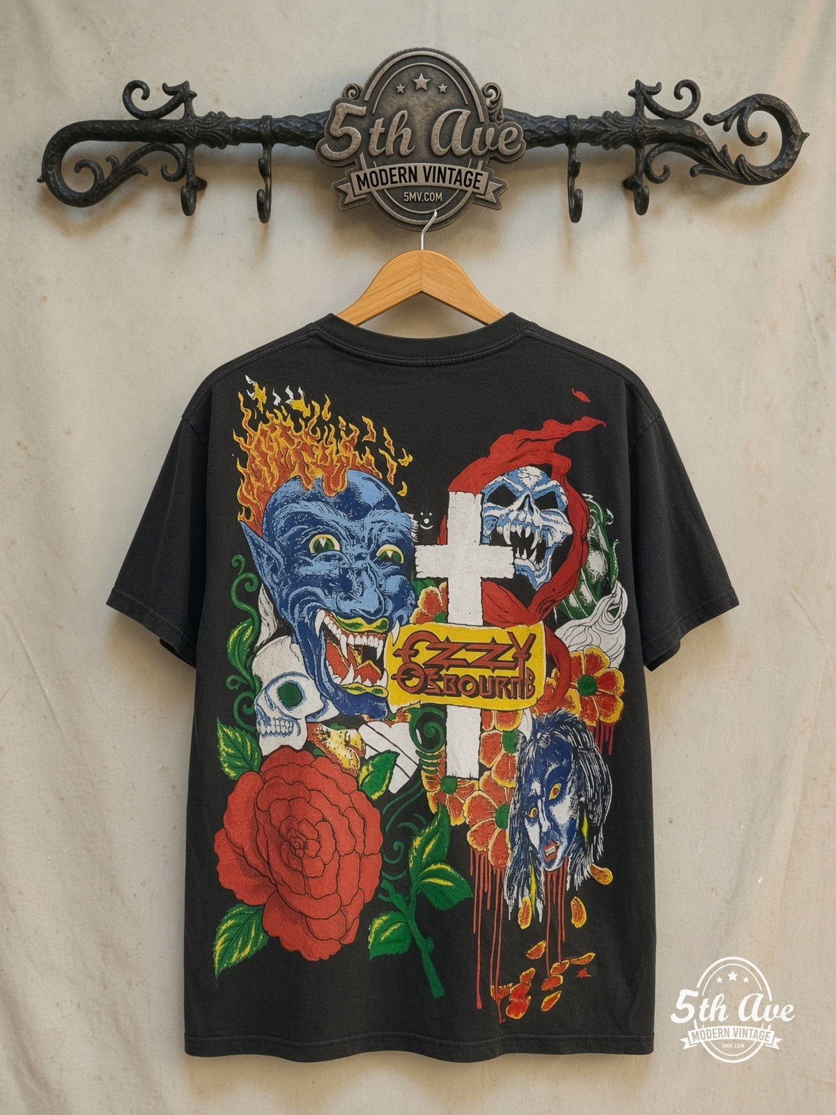 Ozzy Osbourne – Tattoo – All Over Print – Vintage Band T-Shirt — back on locked cream ornate 5th Ave rack