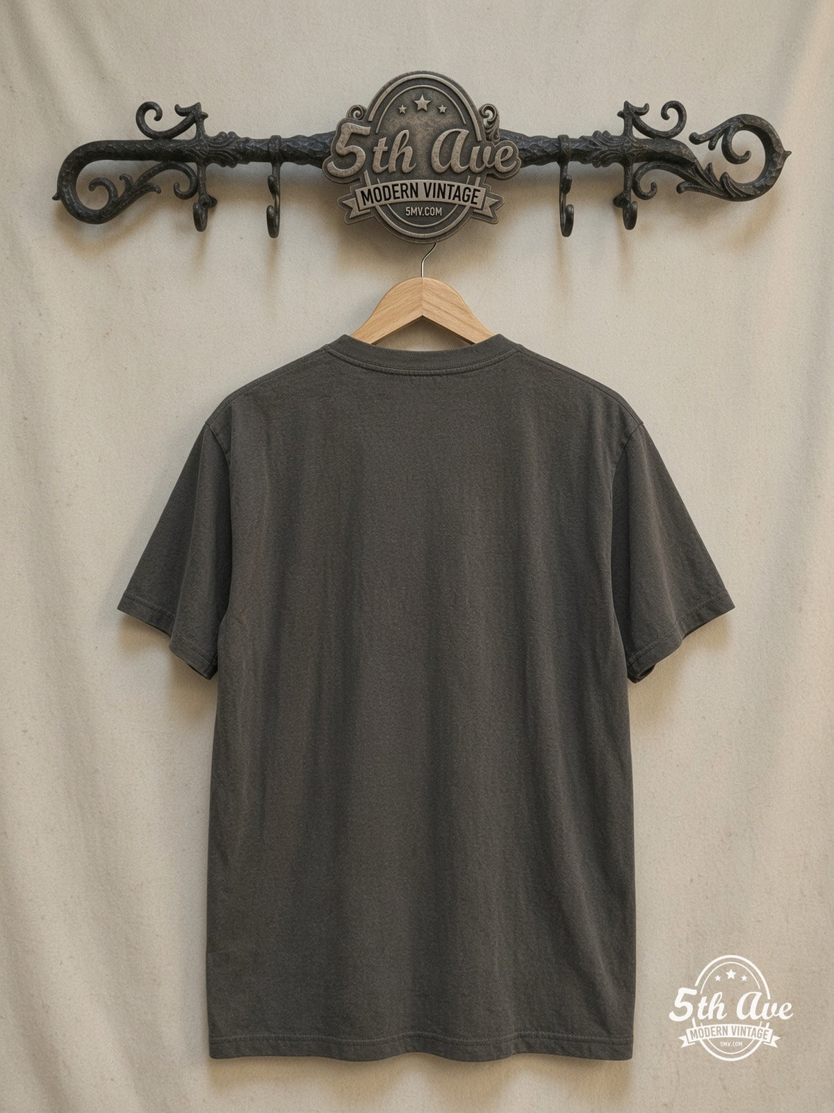 Radiohead – Distressed Urban Band Photo Charcoal – Vintage Band T-Shirt back on locked cream ornate 5th Ave rack
