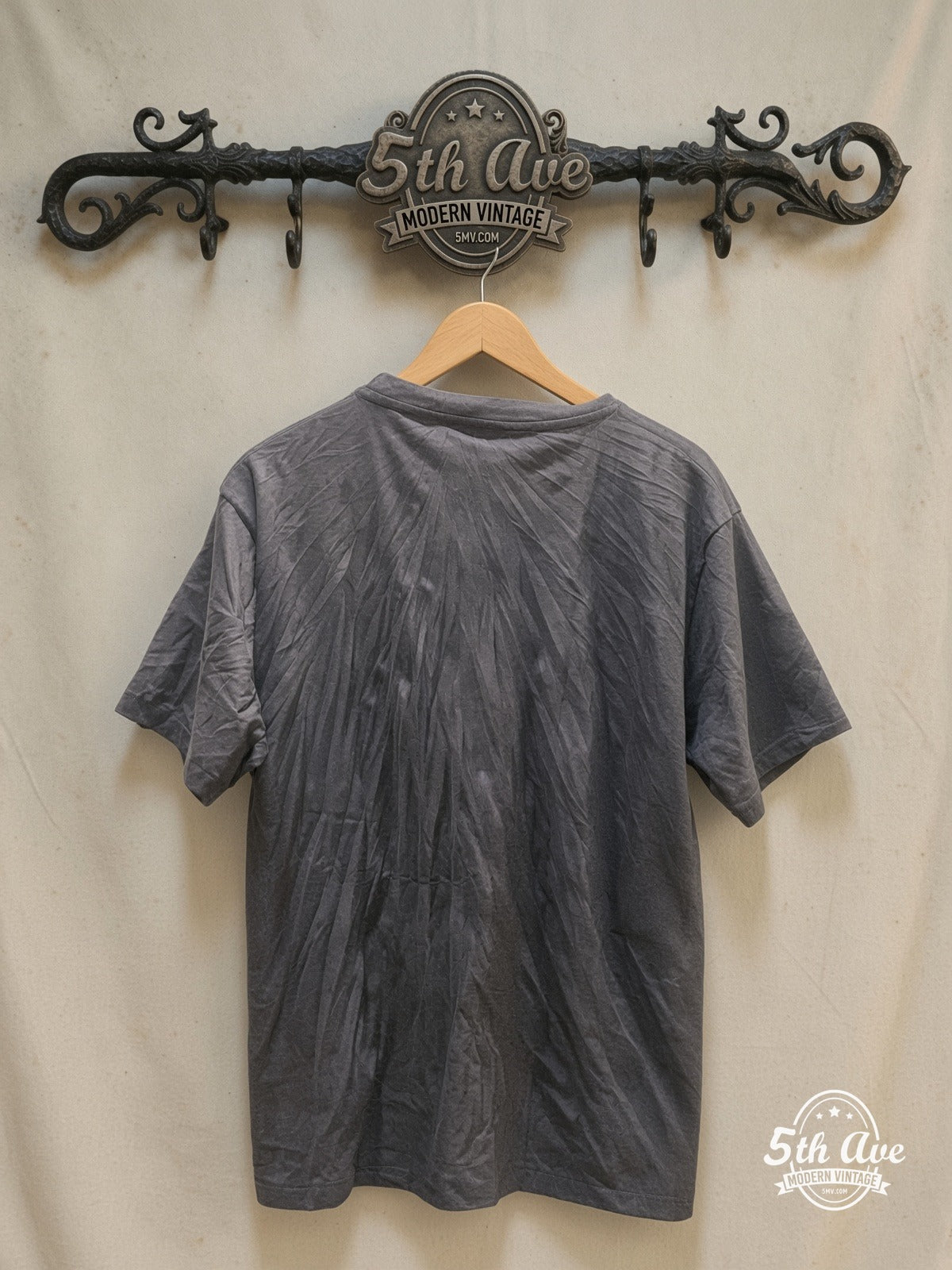 New York Dolls – Vintage Band T-Shirt — back on locked cream ornate 5th Ave rack