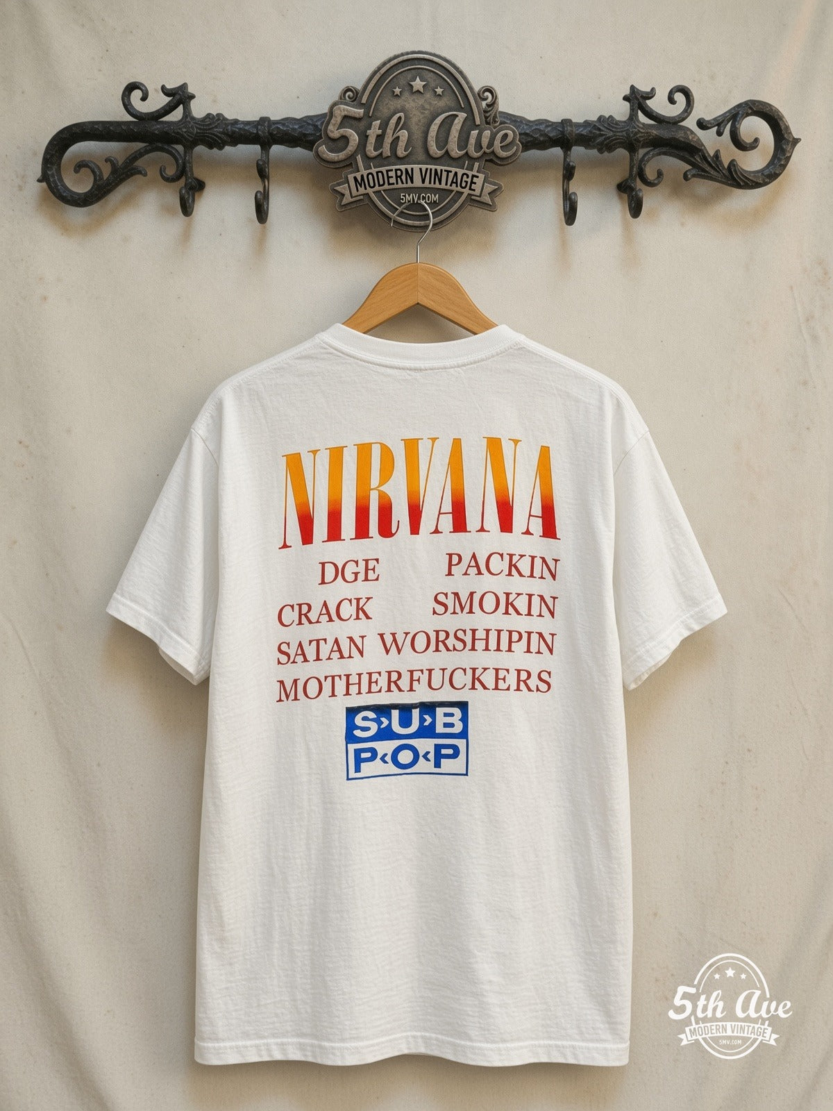 Nirvana – Circles of Hell Yellow Logo White Tee – Vintage Band T-Shirt — back on locked cream ornate 5th Ave rack