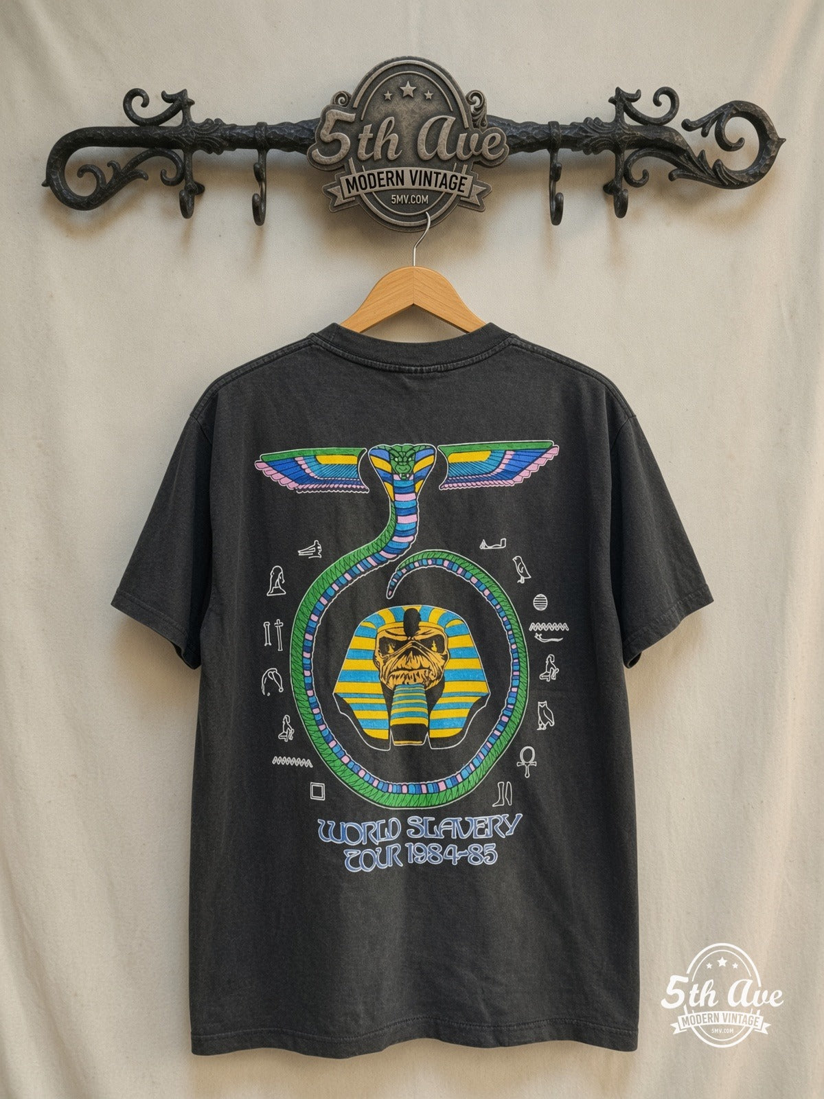 Iron Maiden – World Slavery Tour' 1984/85 – Vintage Band T-Shirt — back on locked cream ornate 5th Ave rack
