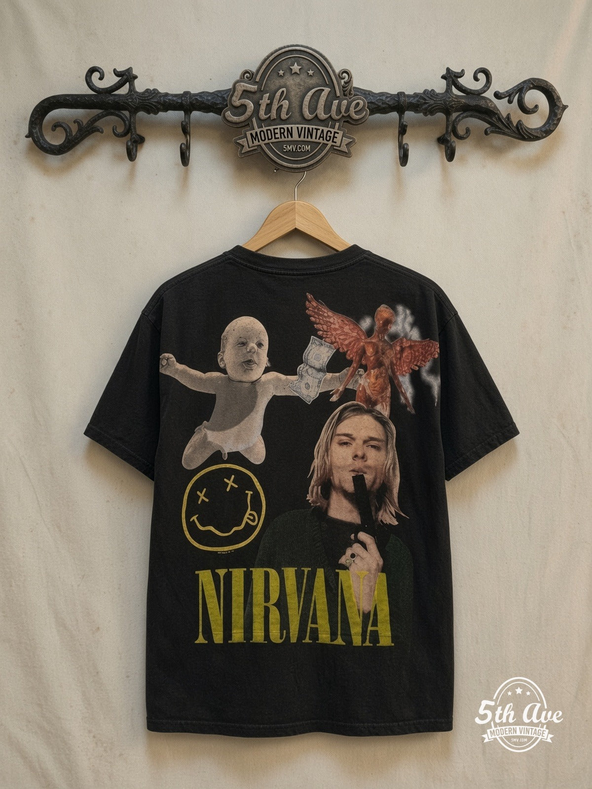 Nirvana – Nevermind Baby Smiley Kurt Collage All Over Print – Vintage Band T-Shirt — back on locked cream ornate 5th Ave rack