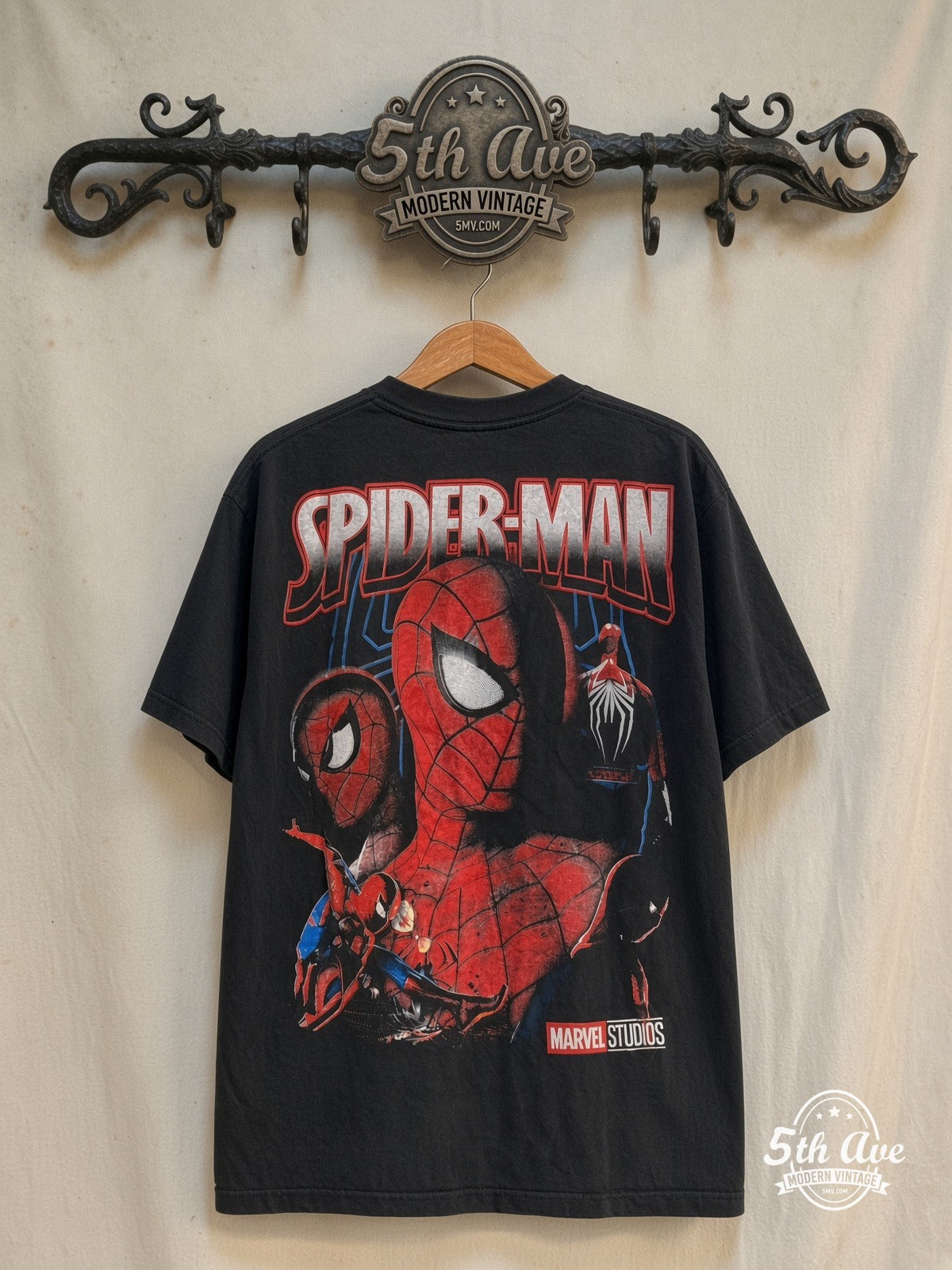 Spider-Man – Marvel Studios Face Collage – Vintage Band T-Shirt — back on locked cream ornate 5th Ave rack