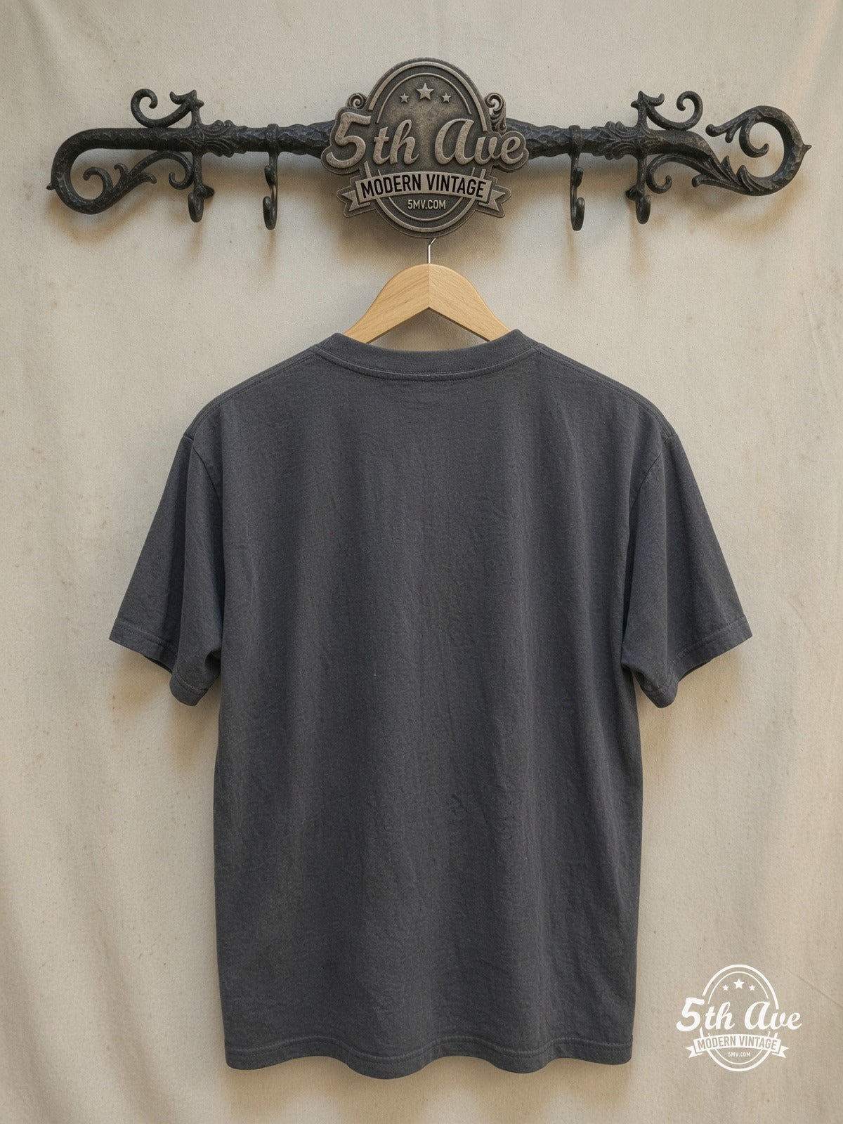THE CRAMPS 100% Cotton New Vintage Band T-Shirt – Vintage Band T-Shirt — back on locked cream ornate 5th Ave rack