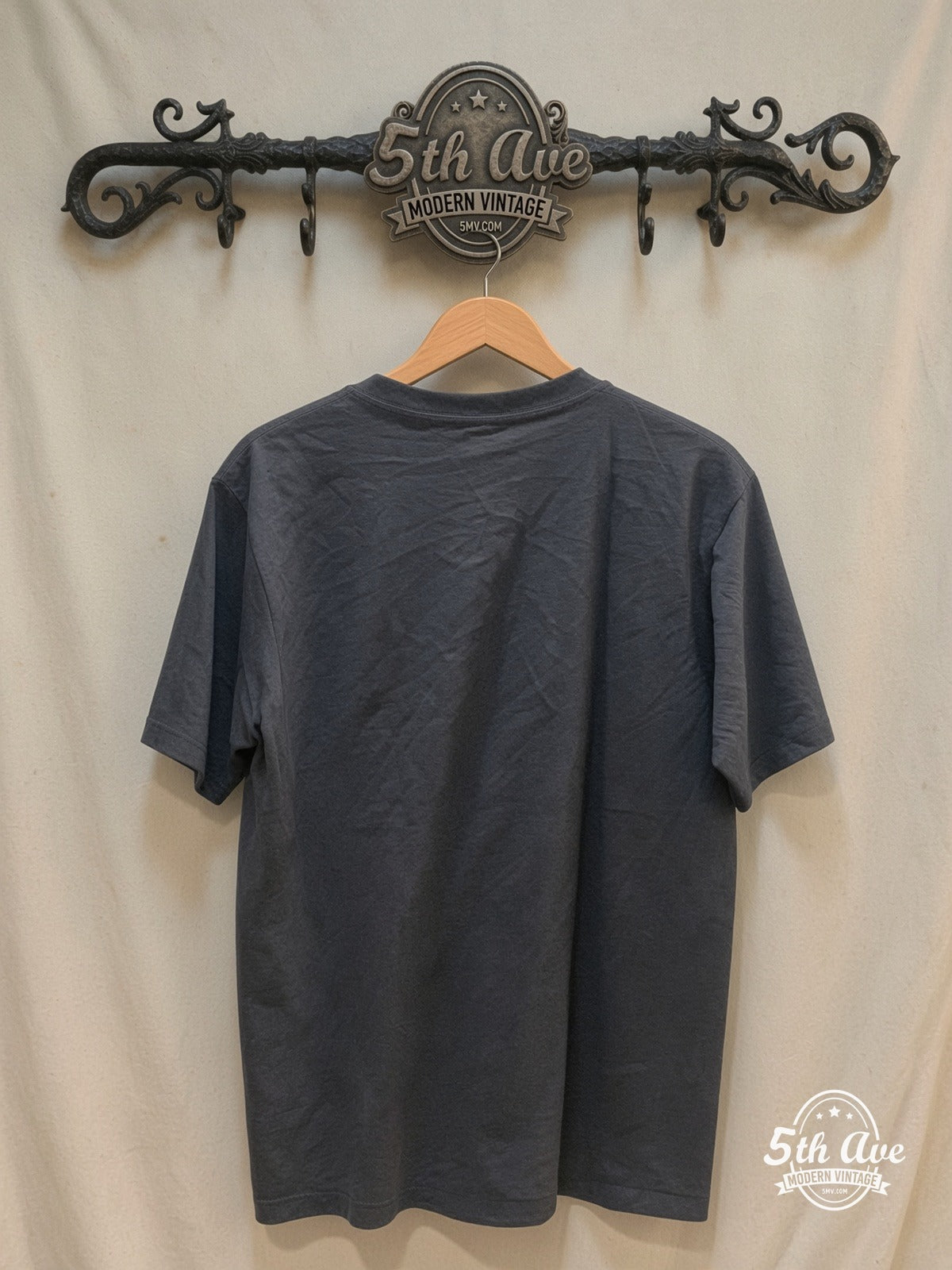 Cold play monochromatic band epic T-Shirt with a touch of light blue – Vintage Band T-Shirt — back on locked cream ornate 5th Ave rack