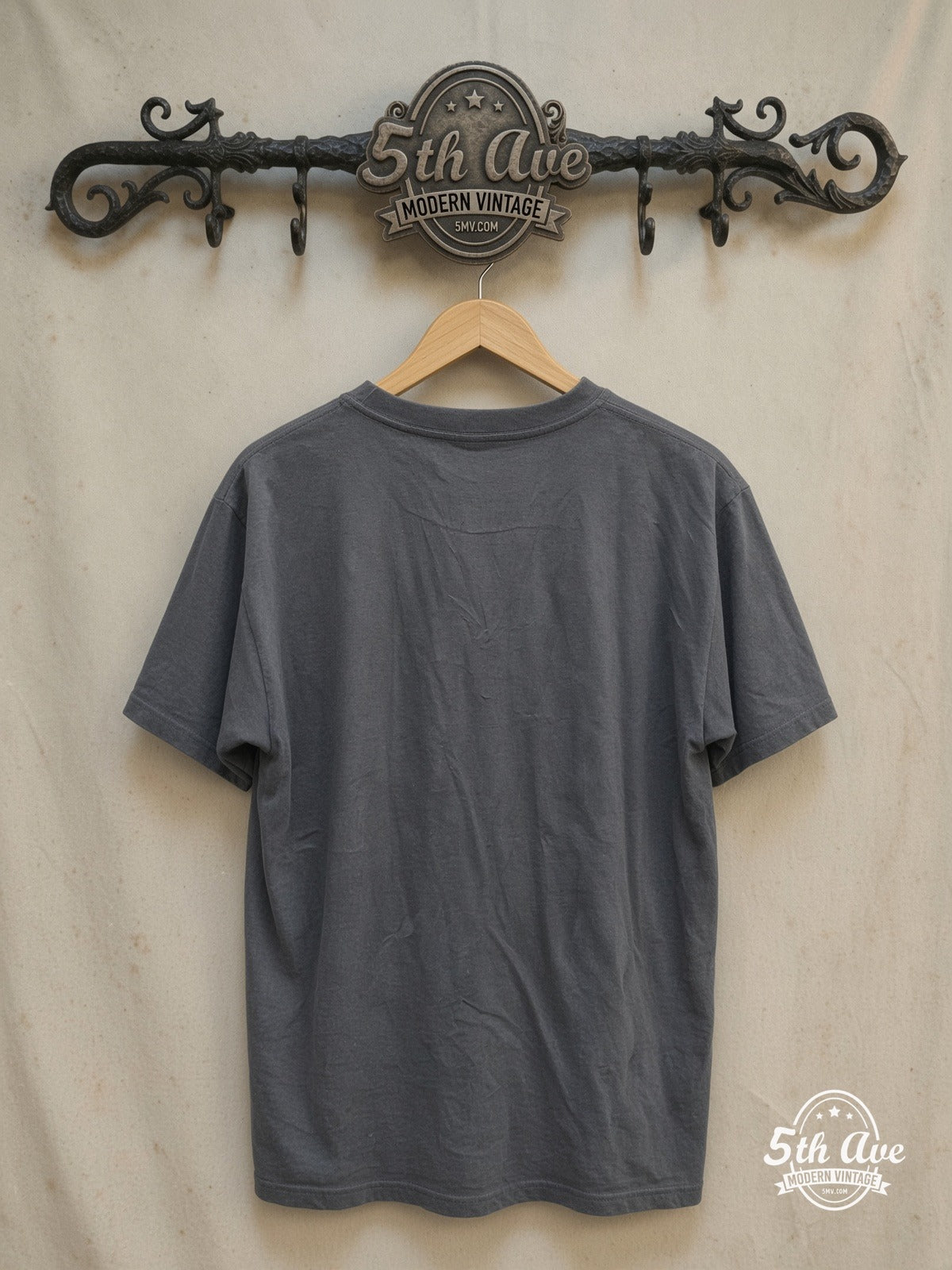 ELTON JOHN 100% Cotton New Vintage Band T-Shirt – Vintage Band T-Shirt — back on locked cream ornate 5th Ave rack