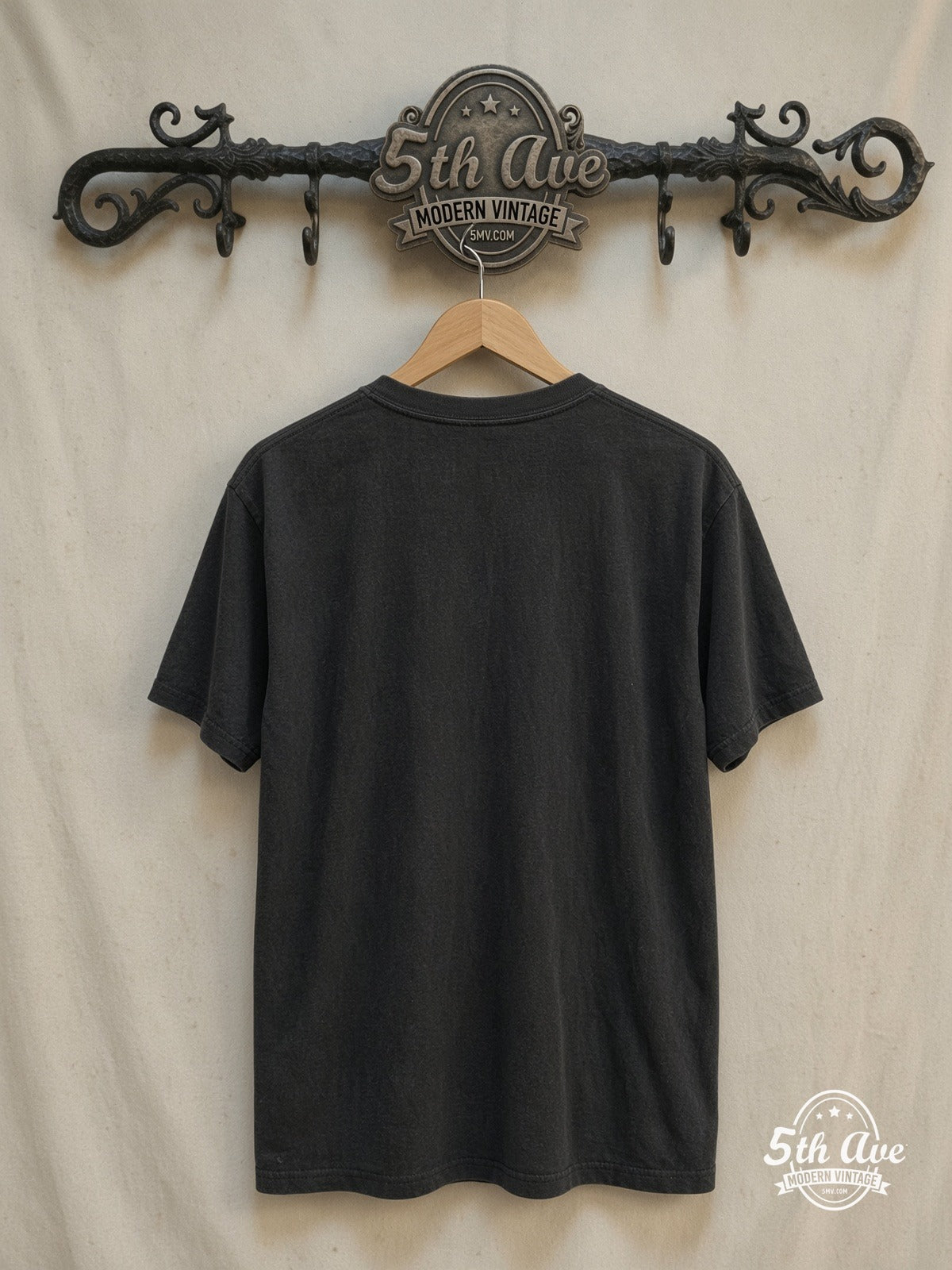 Green Day 100% Cotton New Vintage Band Graphic T-Shirt – Vintage Band T-Shirt — back on locked cream ornate 5th Ave rack