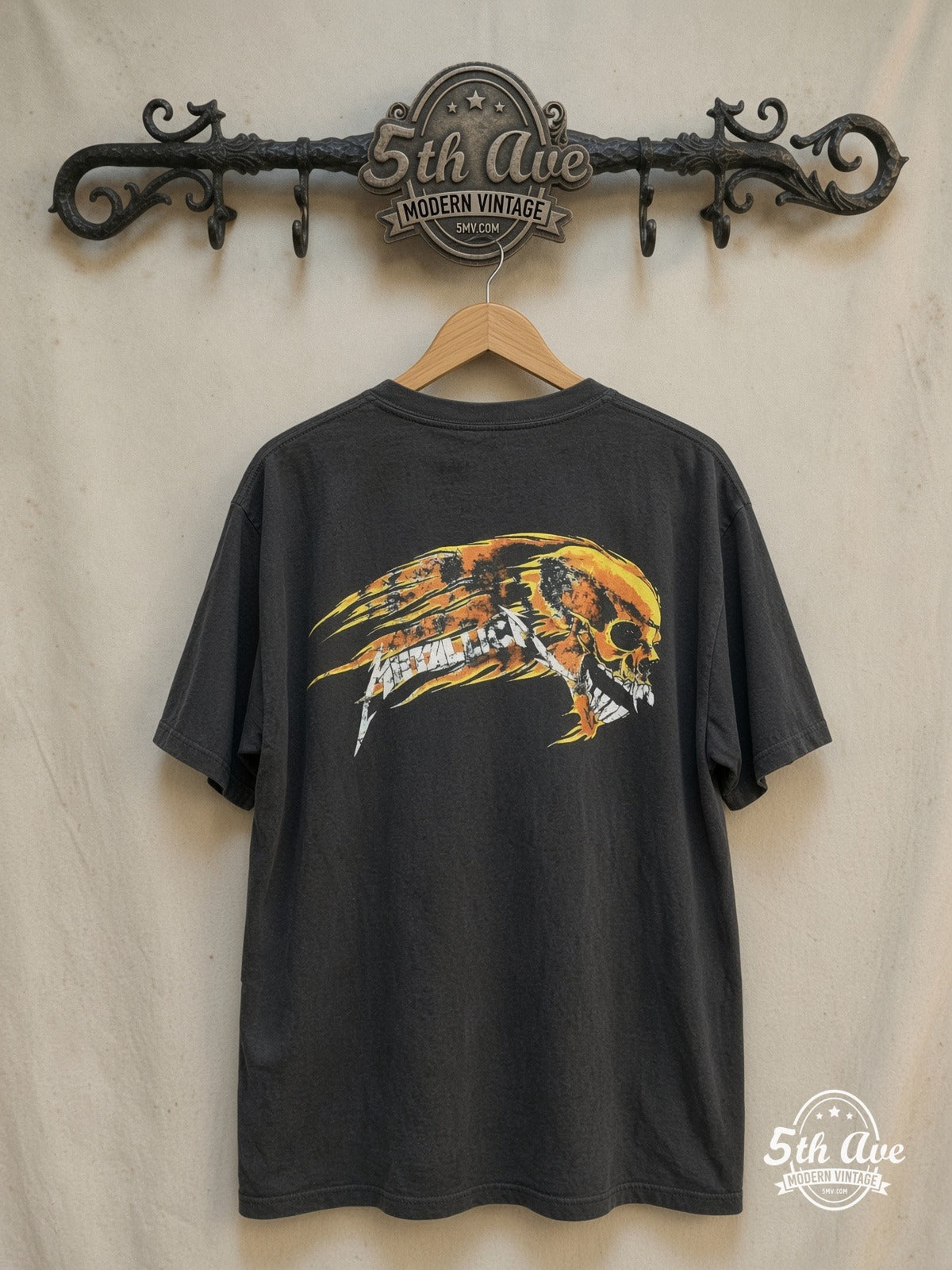 Metallica – Pushead Skull and Flaming Skull – Vintage Band T-Shirt — back on locked cream ornate 5th Ave rack