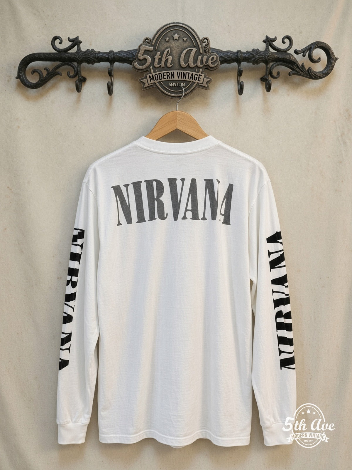 Nirvana – Kurt Cobain 1967-1994 Portrait Long Sleeve – Vintage Band T-Shirt — back on locked cream ornate 5th Ave rack