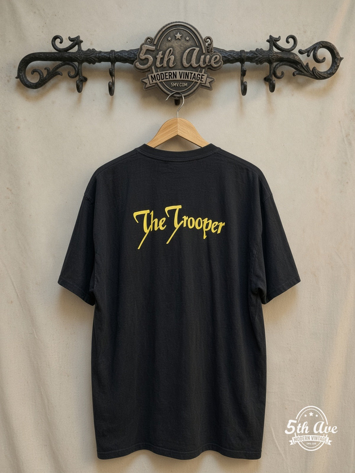 Iron Maiden – The Trooper Eddie Union Jack Sabre – Vintage Band T-Shirt — back on locked cream ornate 5th Ave rack