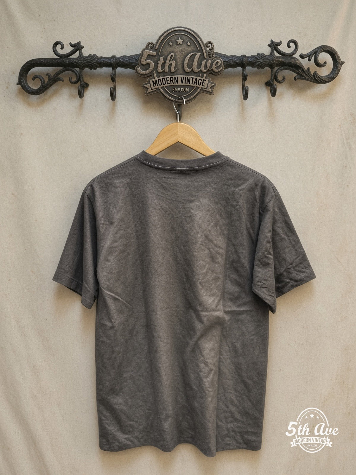 Transcendent Harmony: Black Sabbath Divine Riffs – Vintage Band T-Shirt — back on locked cream ornate 5th Ave rack