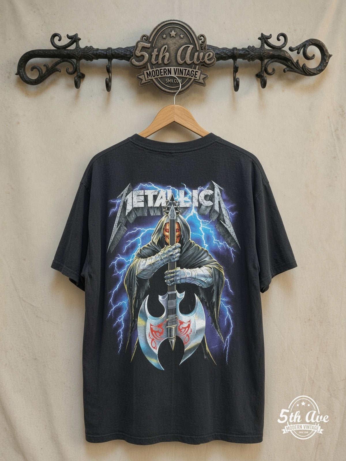 Metallica – Hooded Axe Guitar Blue Lightning – Vintage Band T-Shirt — back on locked cream ornate 5th Ave rack