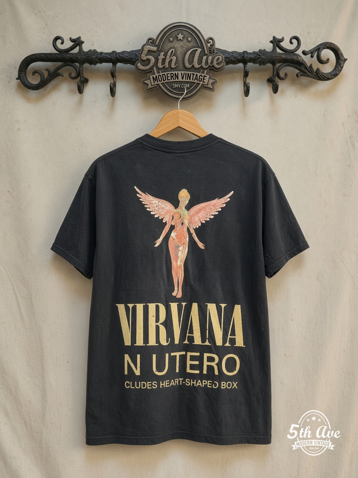Nirvana – In Utero Distressed Angel Yellow Back Print – Vintage Band T-Shirt — back on locked cream ornate 5th Ave rack