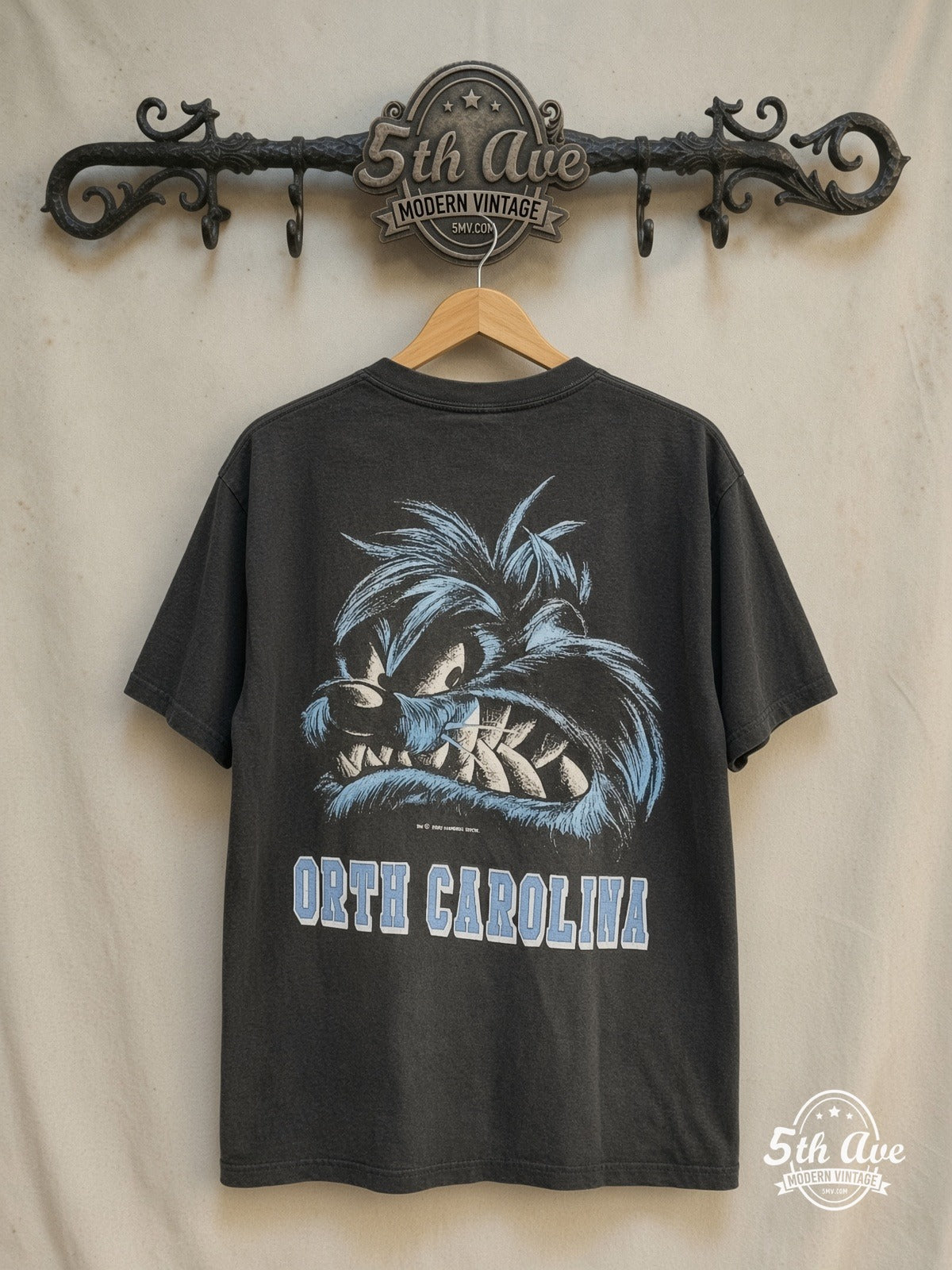 Looney Tunes – Taz-Mania North Carolina – New Vintage Graphic Tee — back on locked cream ornate 5th Ave rack