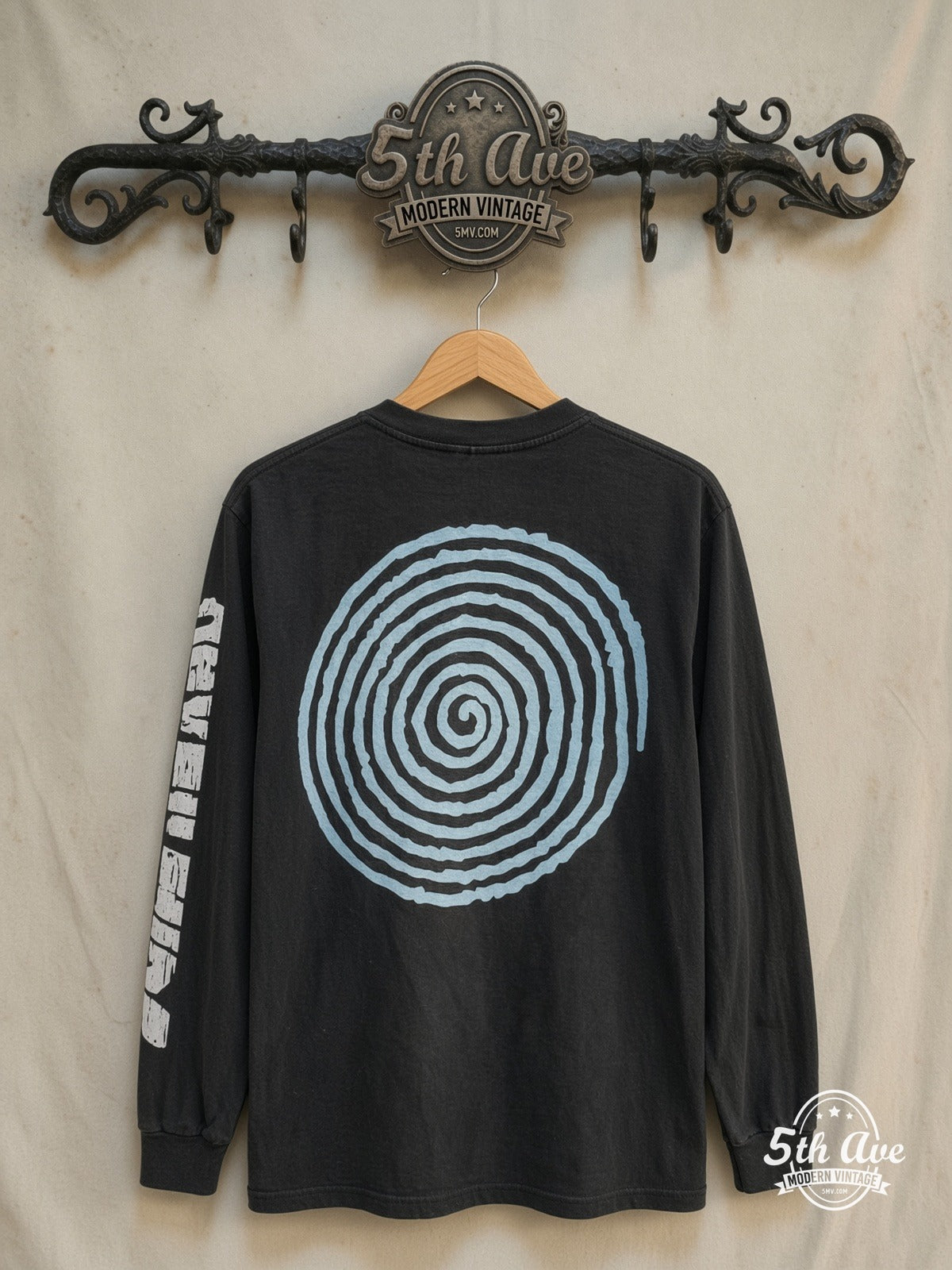 Nirvana – Downward Spiral – Vintage Band T-Shirt — back on locked cream ornate 5th Ave rack
