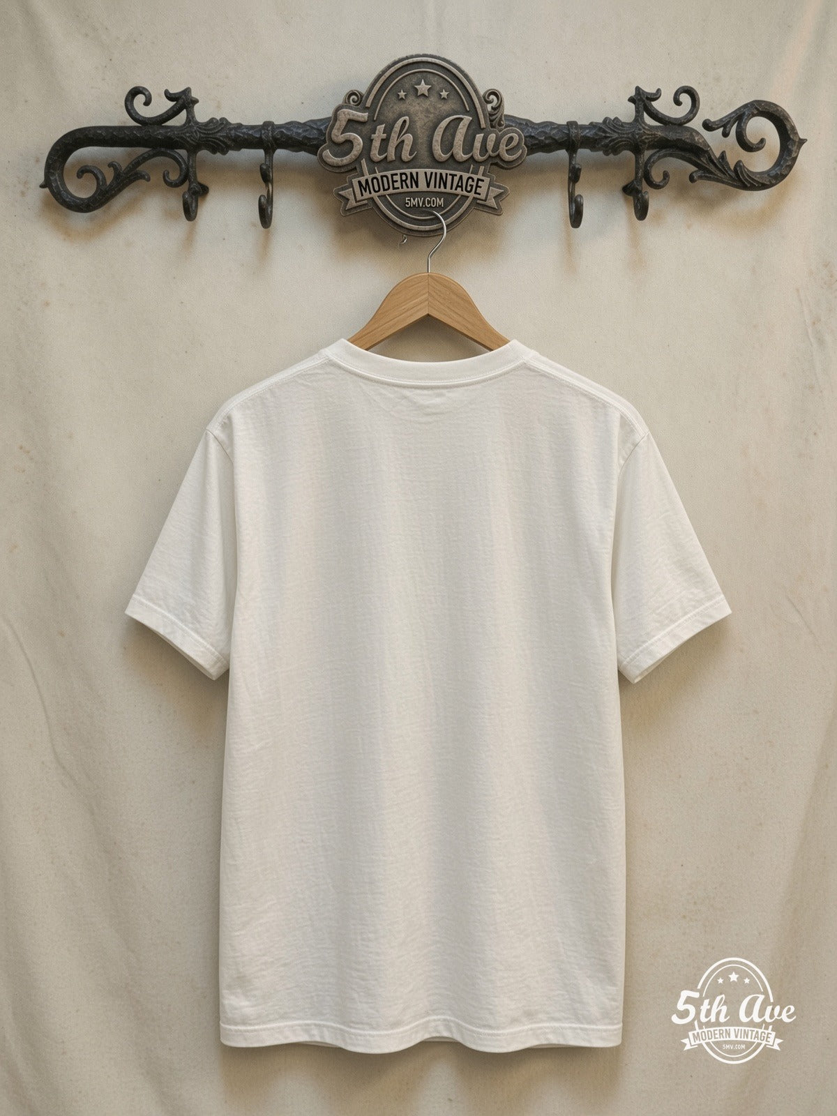 The Allman Brothers Band – Black Distressed Script Logo – Vintage Band T-Shirt — back on locked cream ornate 5th Ave rack