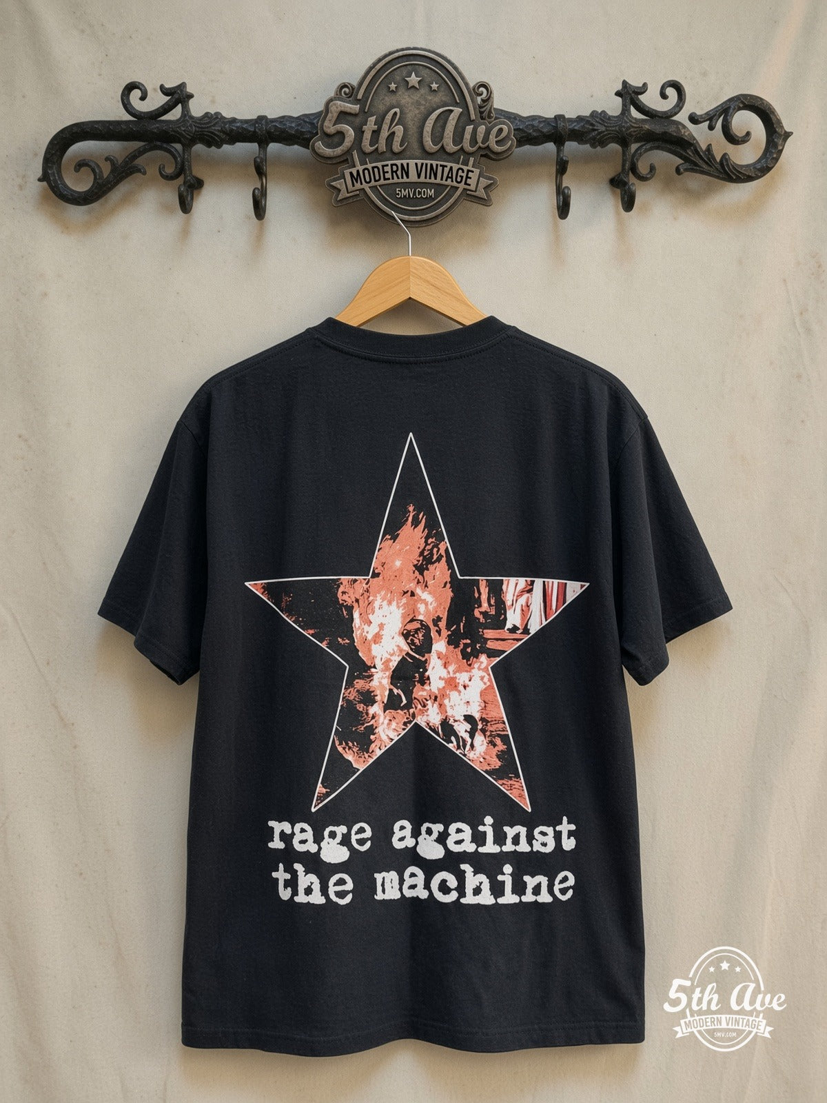 Rage Against the Machine – Bombtrack – Vintage Band T-Shirt — back on locked cream ornate 5th Ave rack