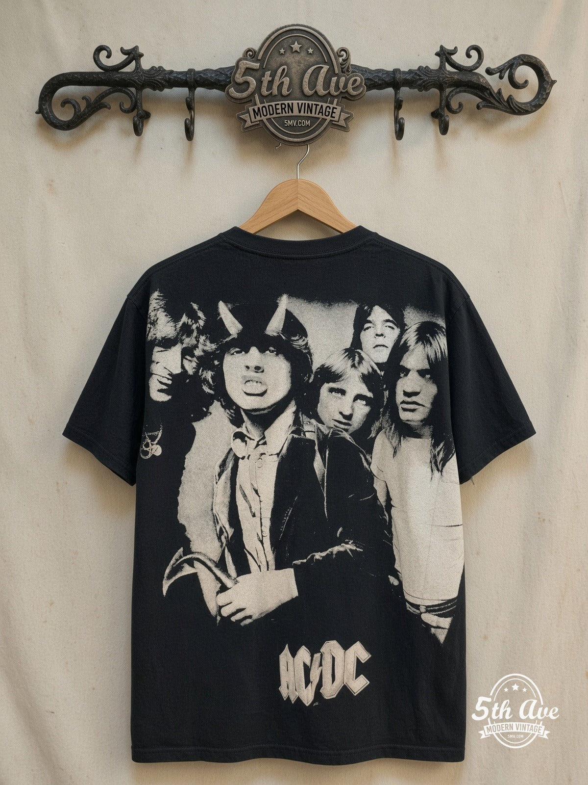 AC/DC – AC/DC – All Over Print – Vintage Band T-Shirt — back on locked cream ornate 5th Ave rack