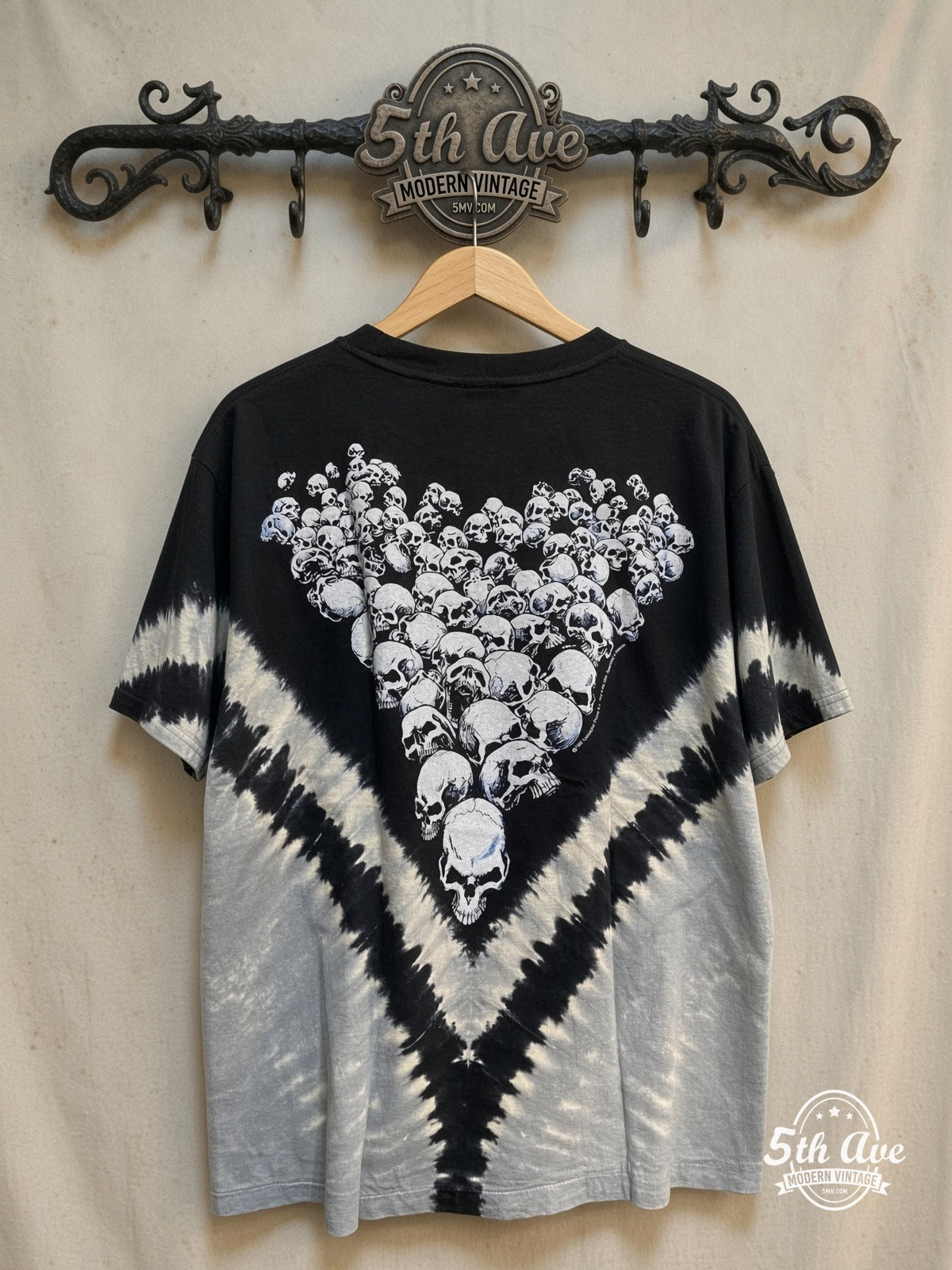 Universe of Transformations: Tie-Dye Artistry Tee – All Over Print – Vintage Band T-Shirt — back on locked cream ornate 5th Ave rack