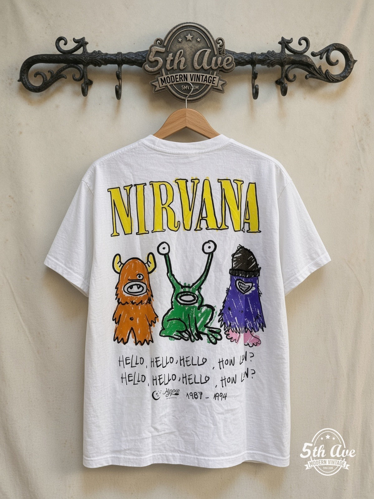 Nirvana – Nevermind Pishier Art – Vintage Band T-Shirt — back on locked cream ornate 5th Ave rack