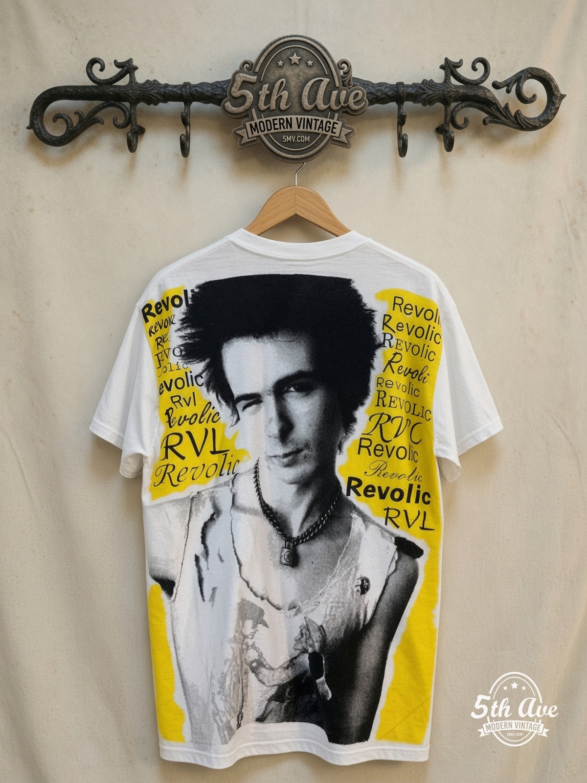 Sex Pistols – Sid Vicious – All Over Print – Vintage Band T-Shirt — back on locked cream ornate 5th Ave rack