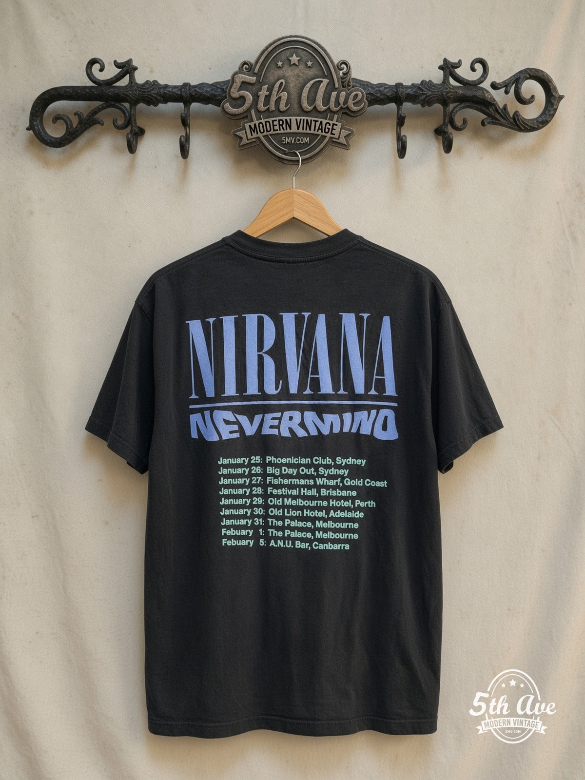 Nirvana – Nevermind Baby – Vintage Band T-Shirt — back on locked cream ornate 5th Ave rack