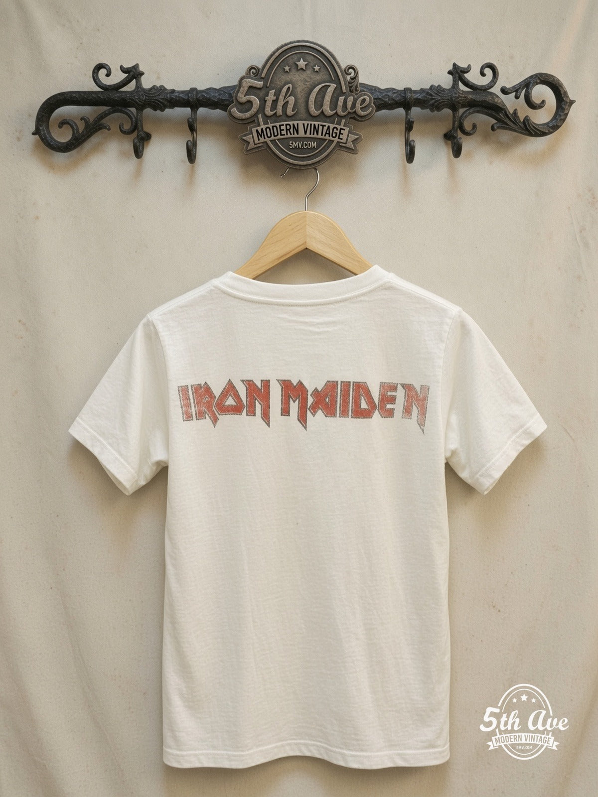 Iron Maiden – Union Jack Band Photo – Vintage Band T-Shirt — back on locked cream ornate 5th Ave rack