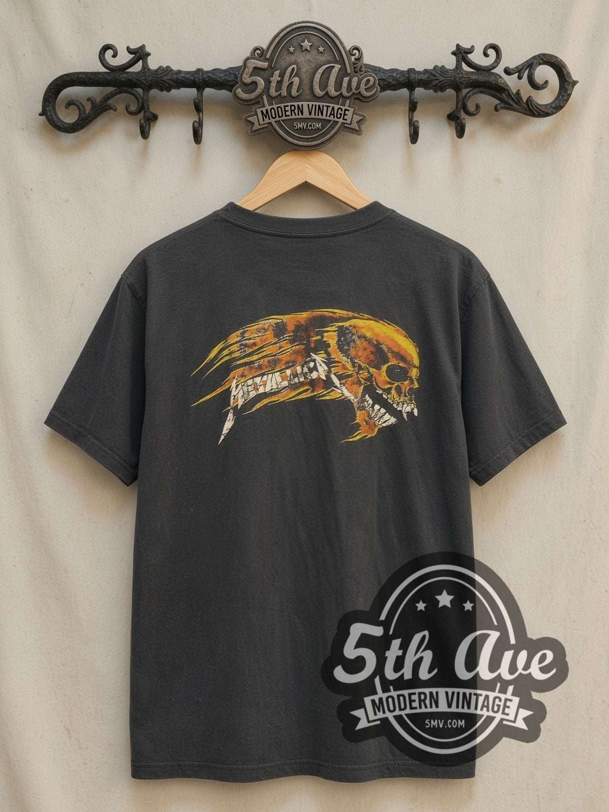 Metallica – Skull Sun with Flaming Skull Back vintage band t-shirt, back view on a display rack