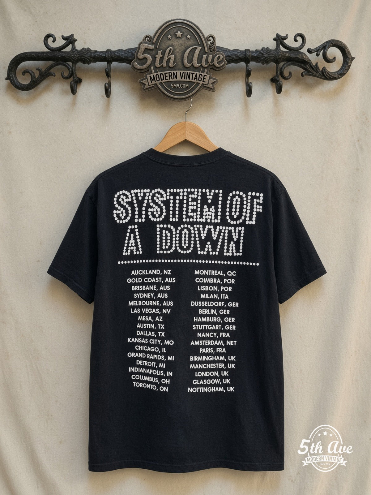 System of a Down – Bush and Saddam Party – Vintage Band T-Shirt — back on locked cream ornate 5th Ave rack