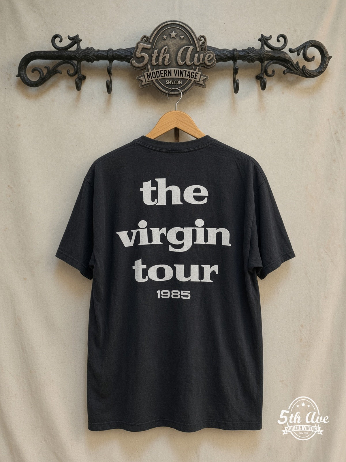Madonna – The Virgin Tour' 1985 – Vintage Band T-Shirt — back on locked cream ornate 5th Ave rack