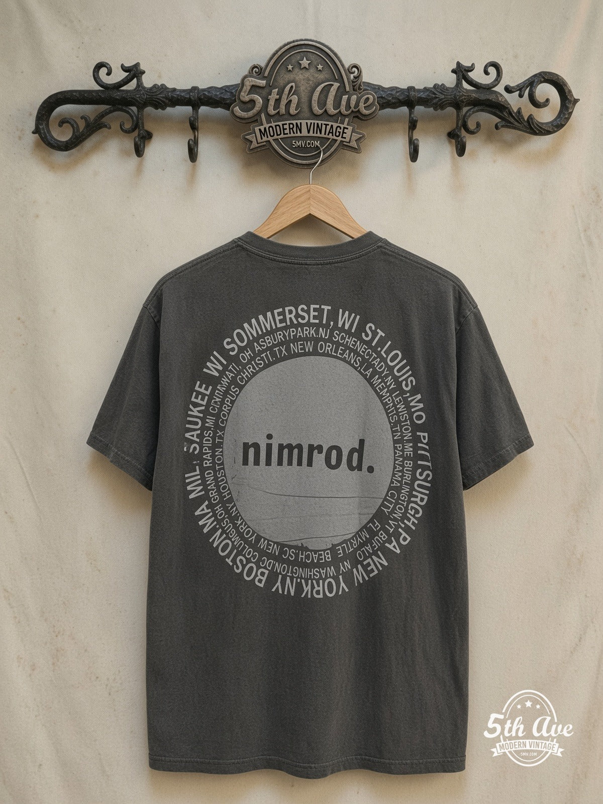 Green Day – Nimrod Tour T-Shirt Vintage Rock Graphic – Vintage Band T-Shirt — back on locked cream ornate 5th Ave rack