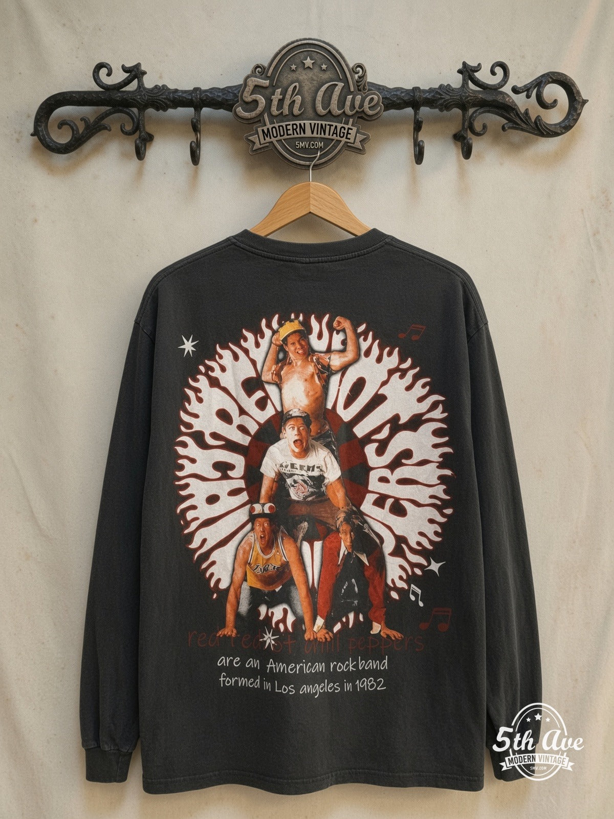 Red Hot Chili Peppers – 1982 All-Over Print – Vintage Band T-Shirt — back on locked cream ornate 5th Ave rack