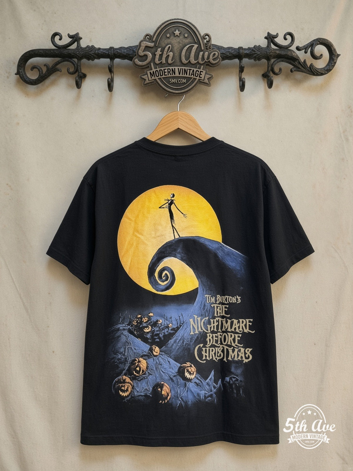 The Nightmare Before Christmas – Jack and Sally – All Over Print – New Vintage Graphic Tee — back on locked cream ornate 5th Ave rack