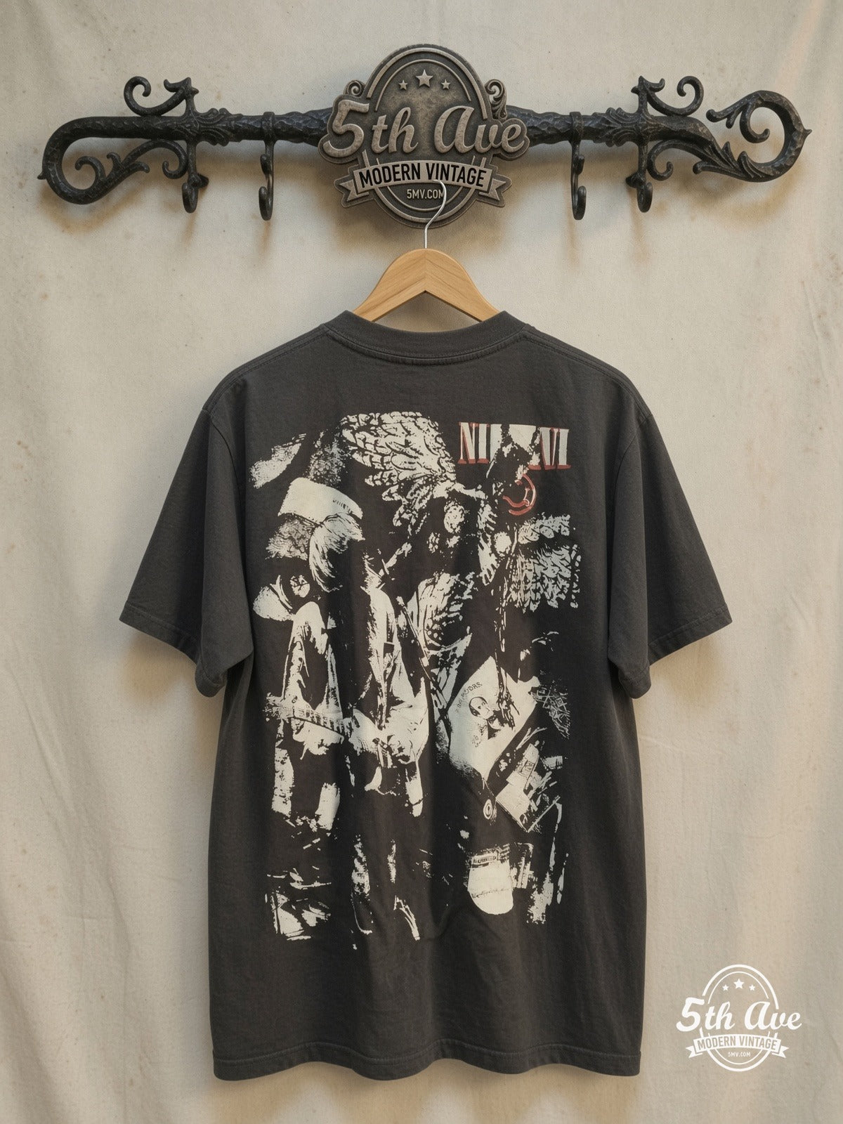 Nirvana – Kurt Cobain Shock Collage – Vintage Band T-Shirt — back on locked cream ornate 5th Ave rack