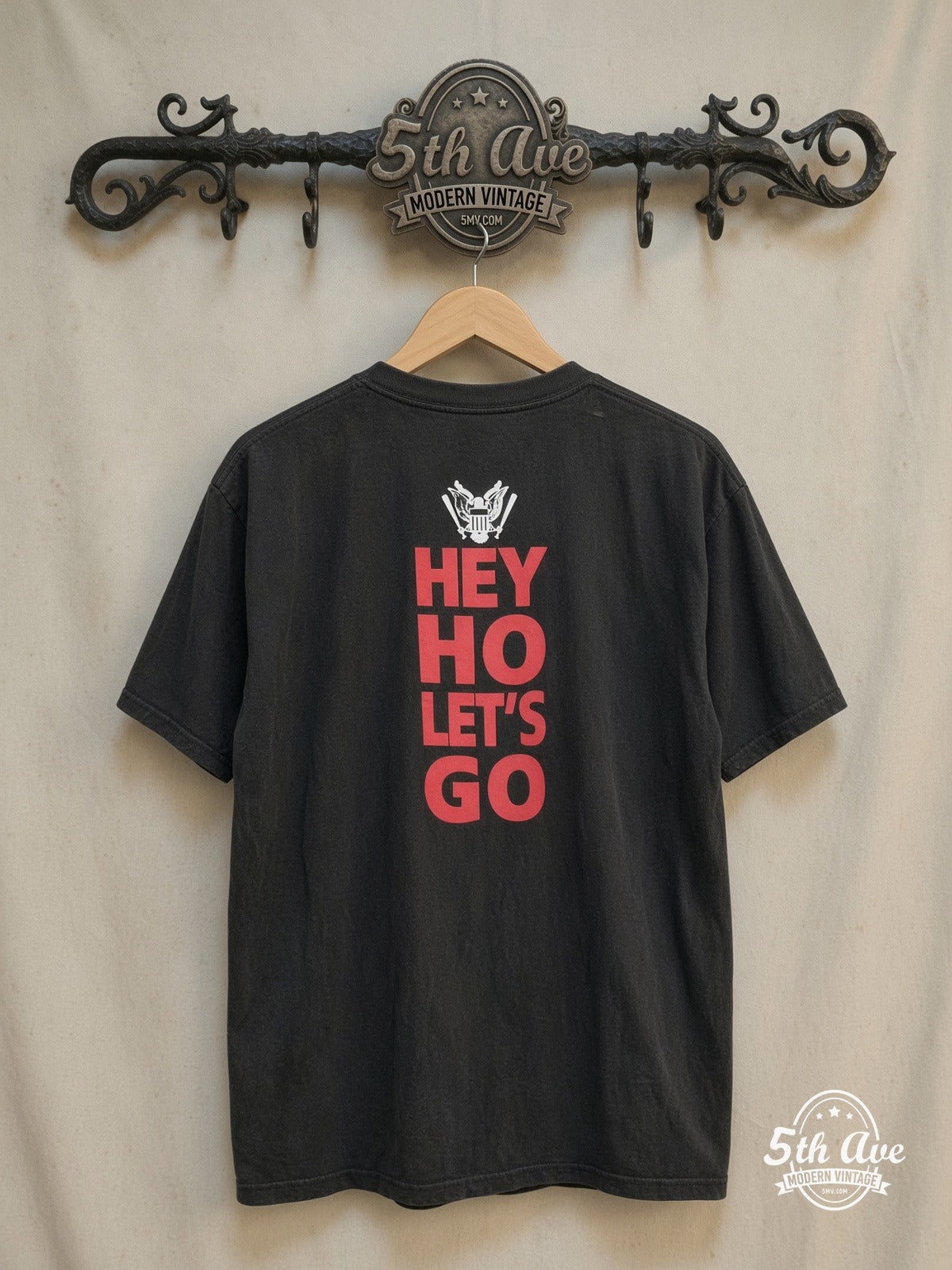Ramones Presidential Seal t shirt: A Punk Rock Icon – Vintage Band T-Shirt — back on locked cream ornate 5th Ave rack