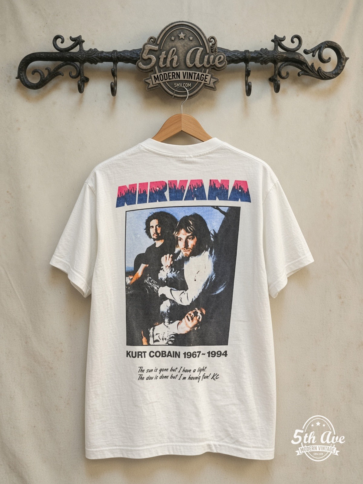 Nirvana – 1964-1994 Tribute – Vintage Band T-Shirt — back on locked cream ornate 5th Ave rack