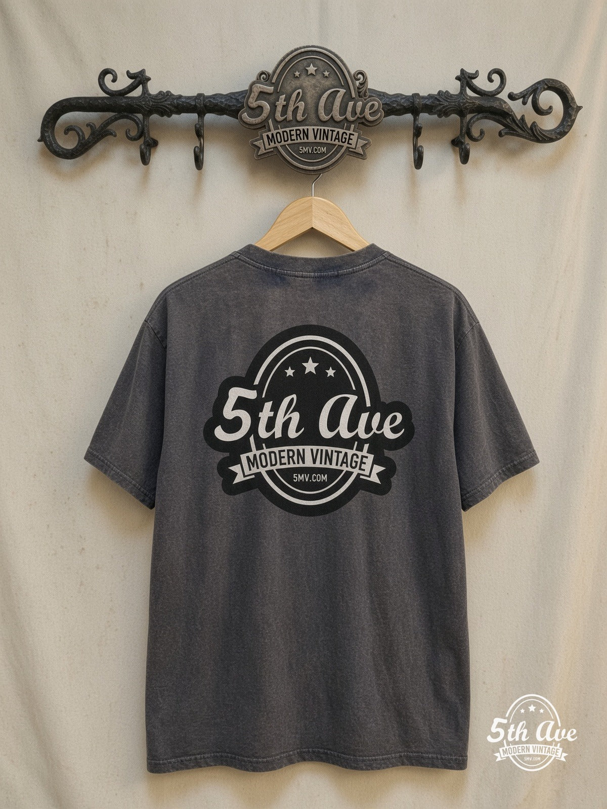 Nirvana – Teal Logo Band Trio Photo – Vintage Band T-Shirt — back on locked cream ornate 5th Ave rack