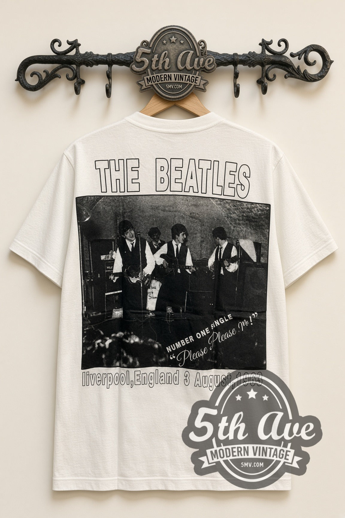 The Beatles – Yellow Bubble Font Early Photo – Vintage Band T-Shirt, back view on a display rack
