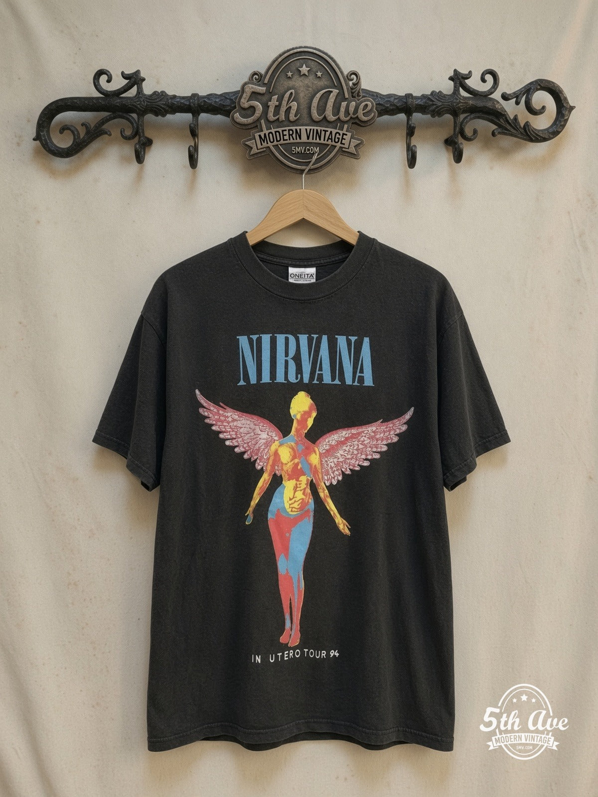 Nirvana – In Utero Tour 94 Angel Long Sleeve – Vintage Band T-Shirt — front on locked cream ornate 5th Ave rack
