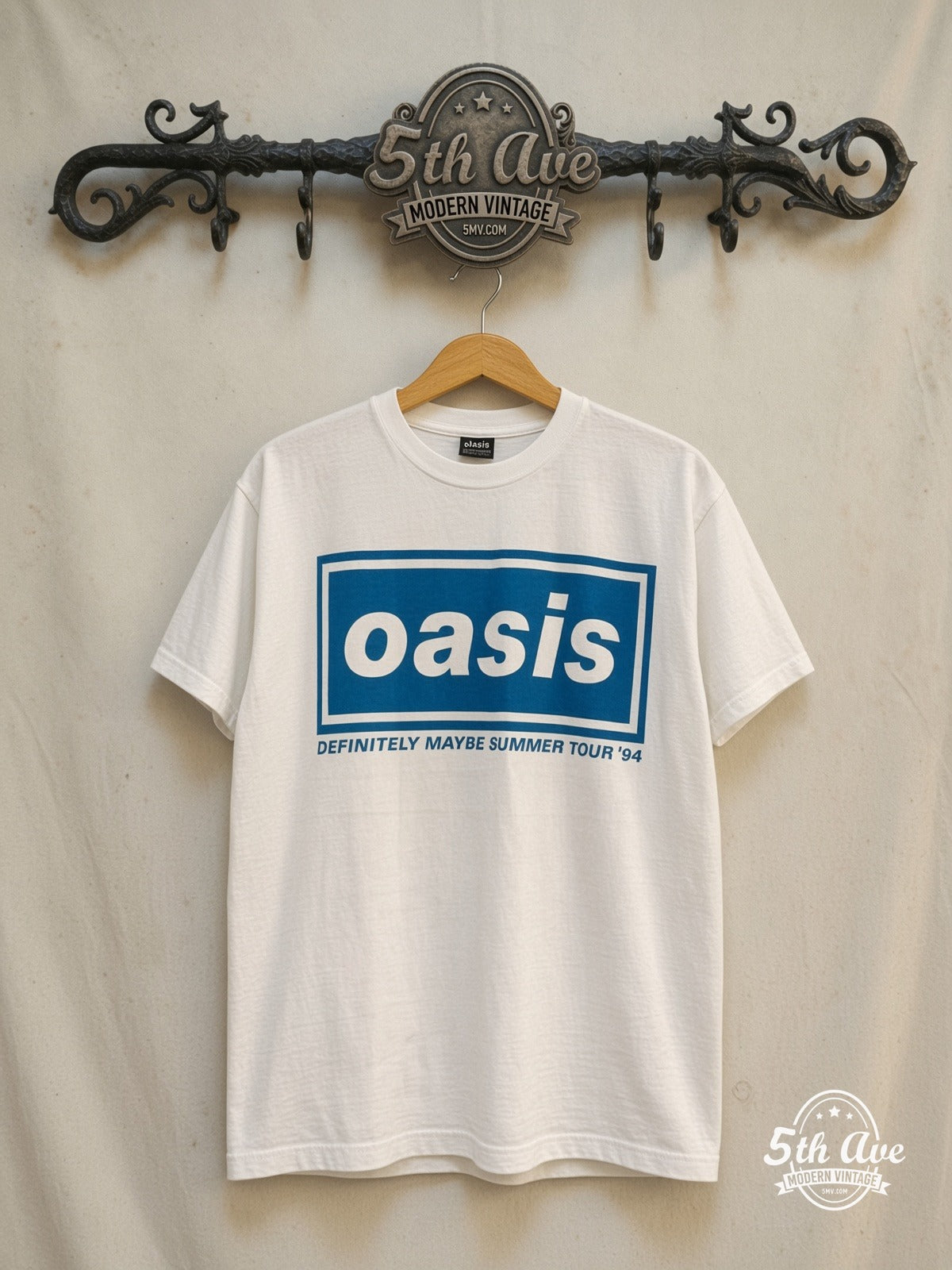Oasis – Definitely Maybe Summer Tour 1994 – Vintage Band T-Shirt — front on locked cream ornate 5th Ave rack