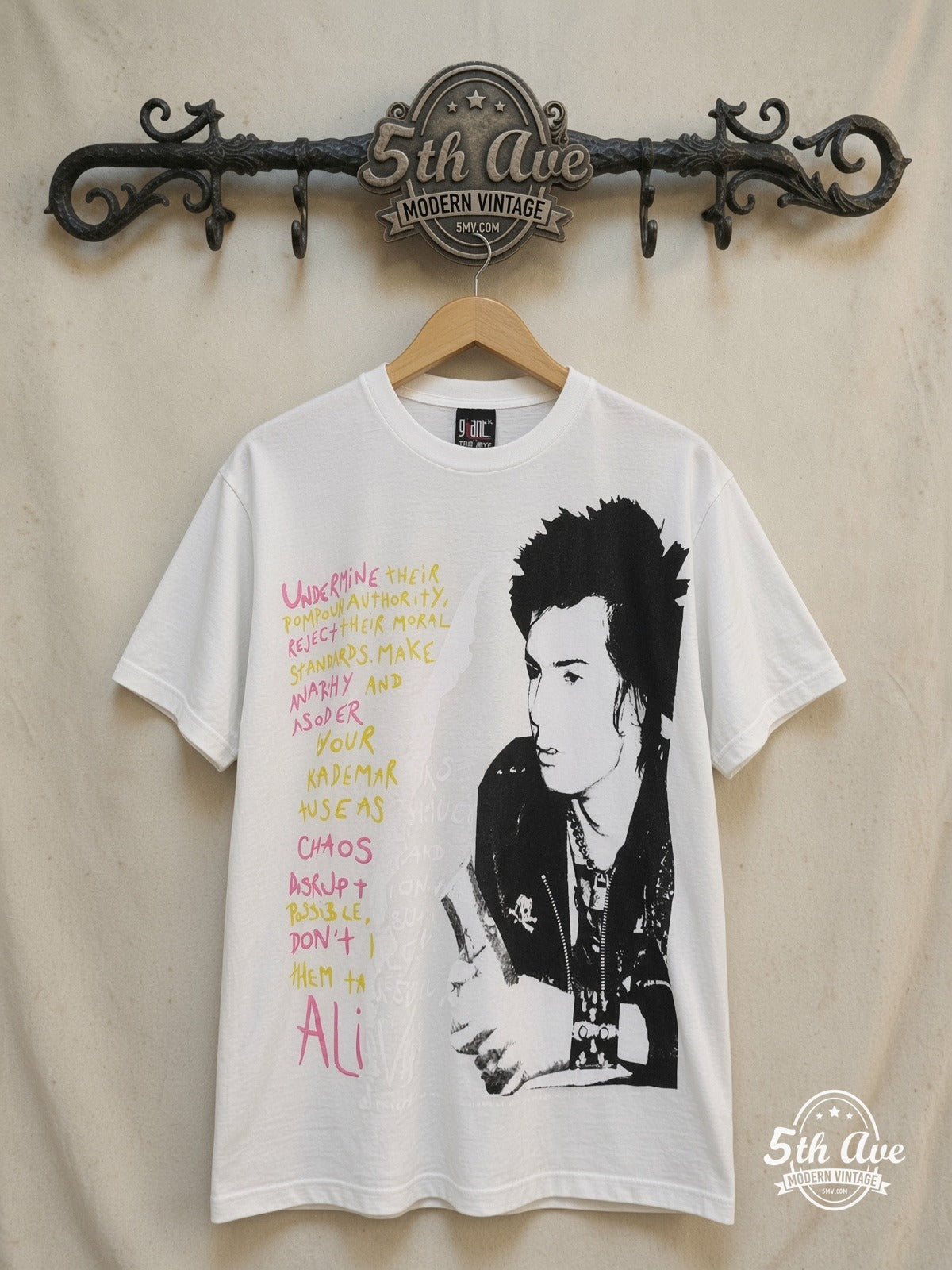 Sex Pistols / Sid Vicious – All-Over Print Portrait – Vintage Band T-Shirt — front on locked cream ornate 5th Ave rack