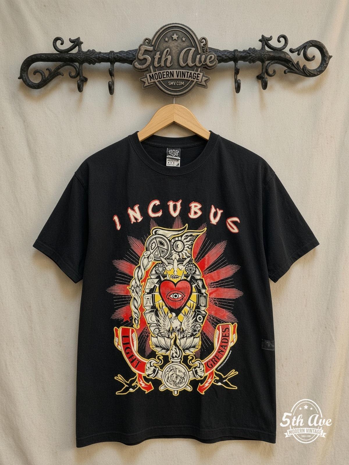 Incubus – Vintage Band T-Shirt — front on locked cream ornate 5th Ave rack