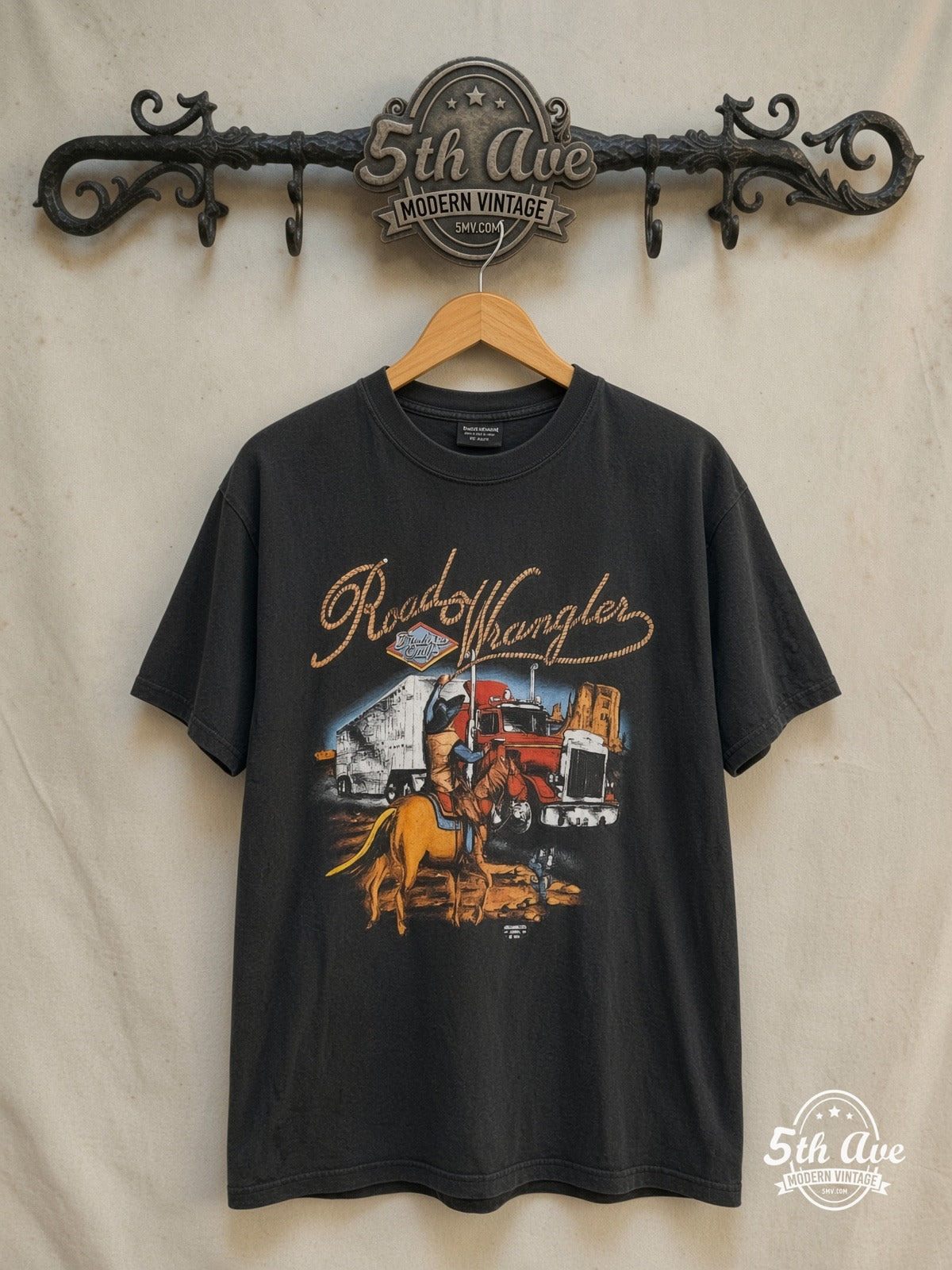 Road Wrangler Truckers Only Big Sioux Truck Stop graphic tee in black, front view on a display rack