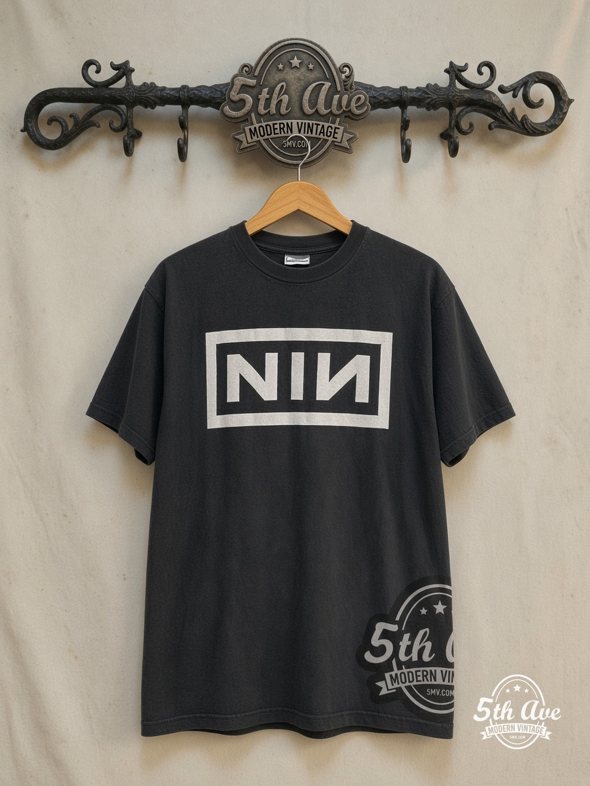 Nine Inch Nails – NIИ 1995 – Vintage Band T-Shirt — front on locked cream ornate 5th Ave rack